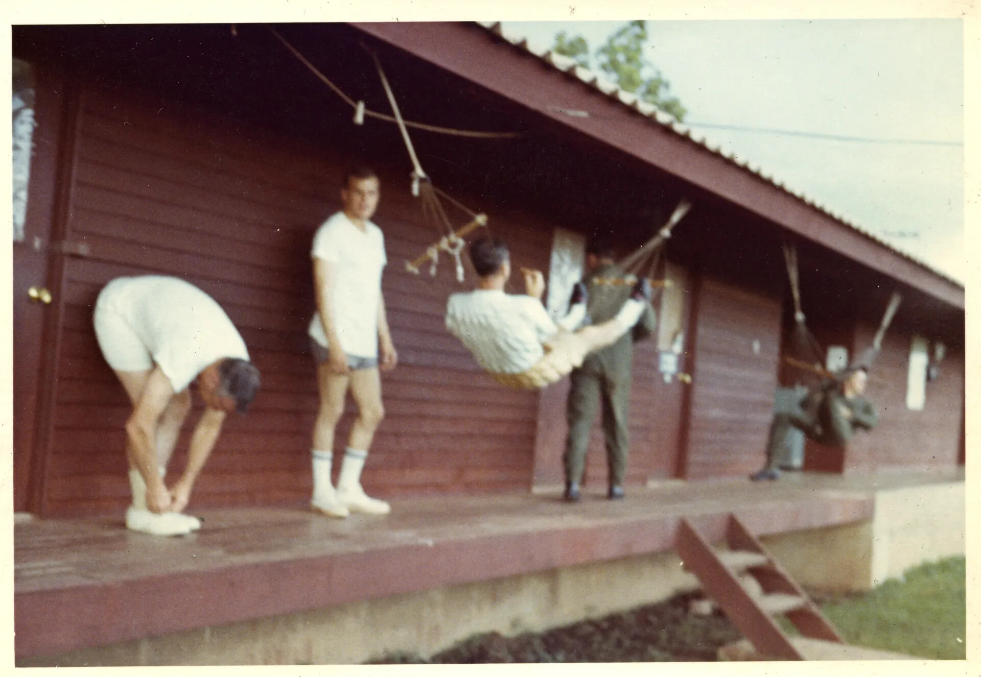 Airmen Relaxing Outside Barracks, Nakhon Phanom (NKP) Air Base, Thailand