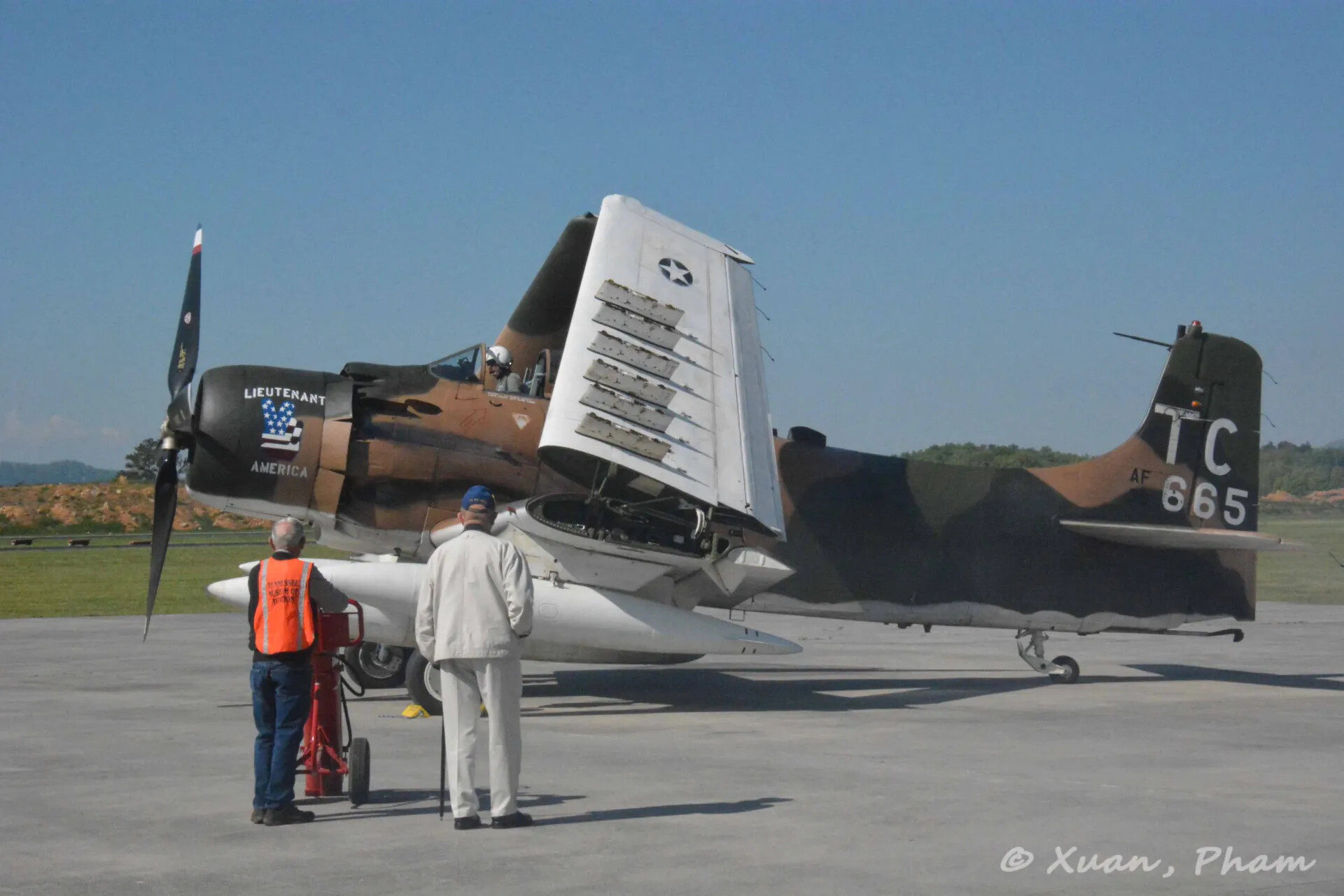 A-1 Skyraider 'Lieutenant America' (TC-665) with Wing Folded, Ground Crew Preparing Aircraft