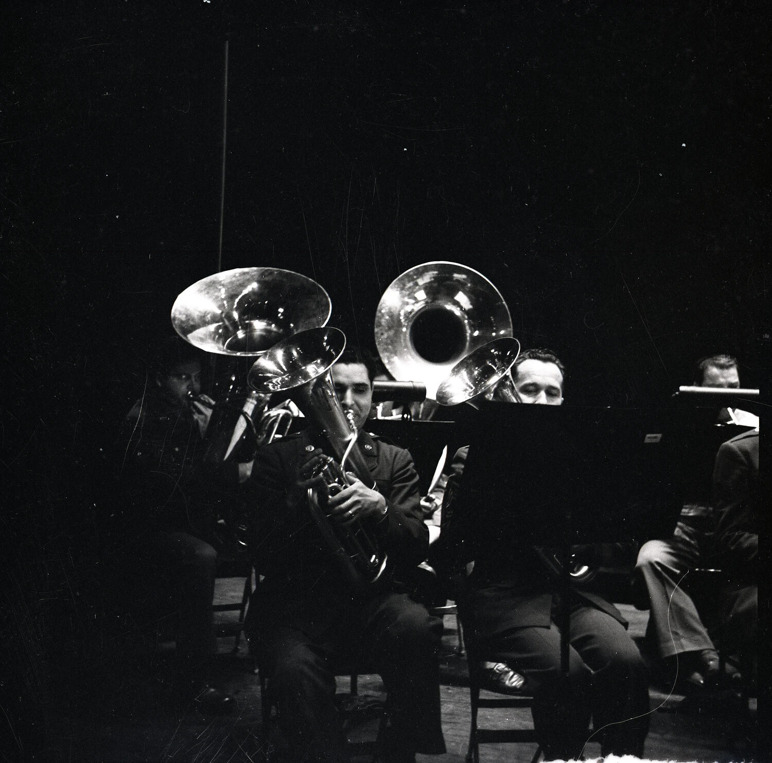 Military Band Brass Section Performing On Stage