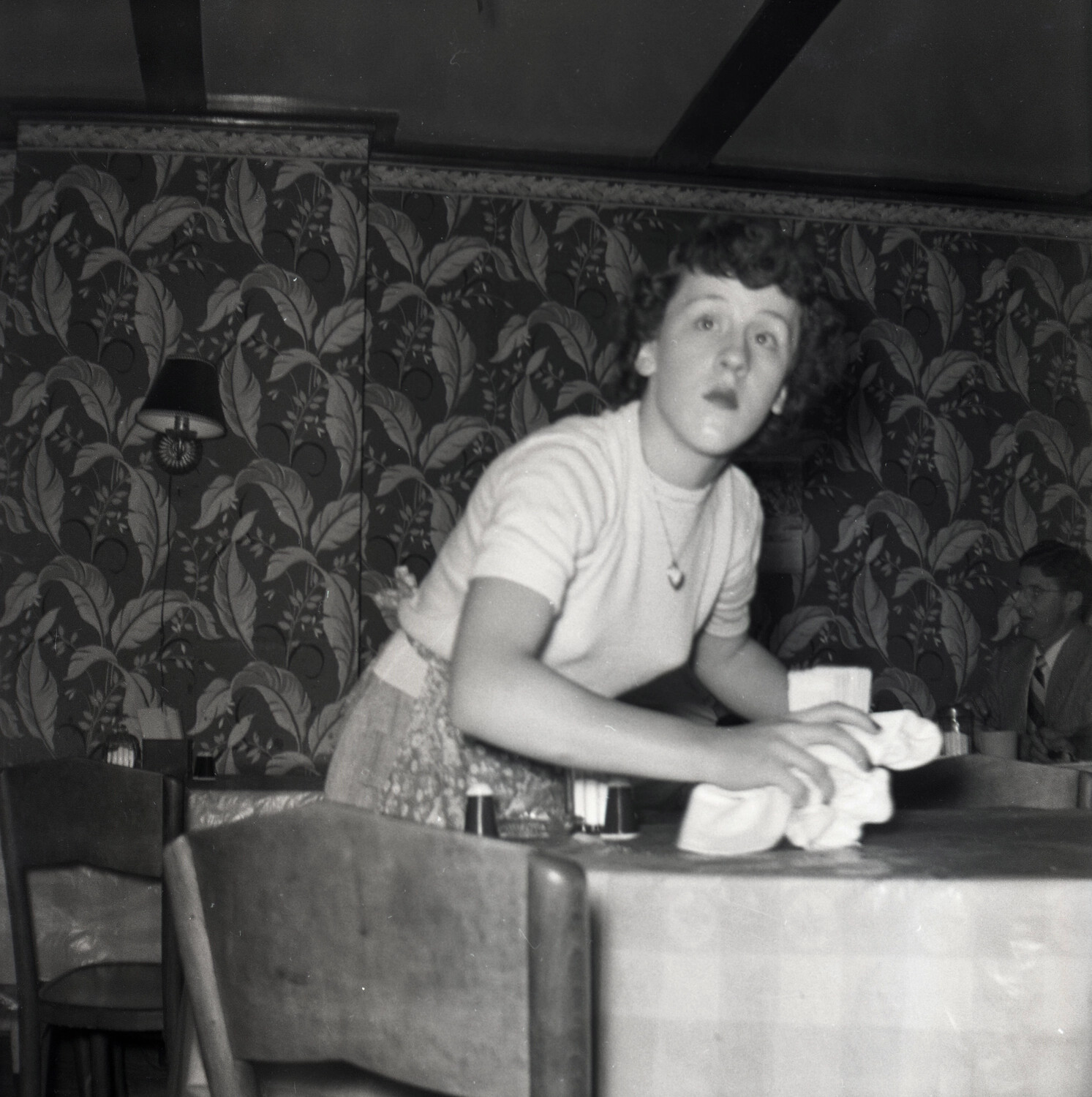 Waitress Setting a Table, Mid-Century Restaurant Dining Room
