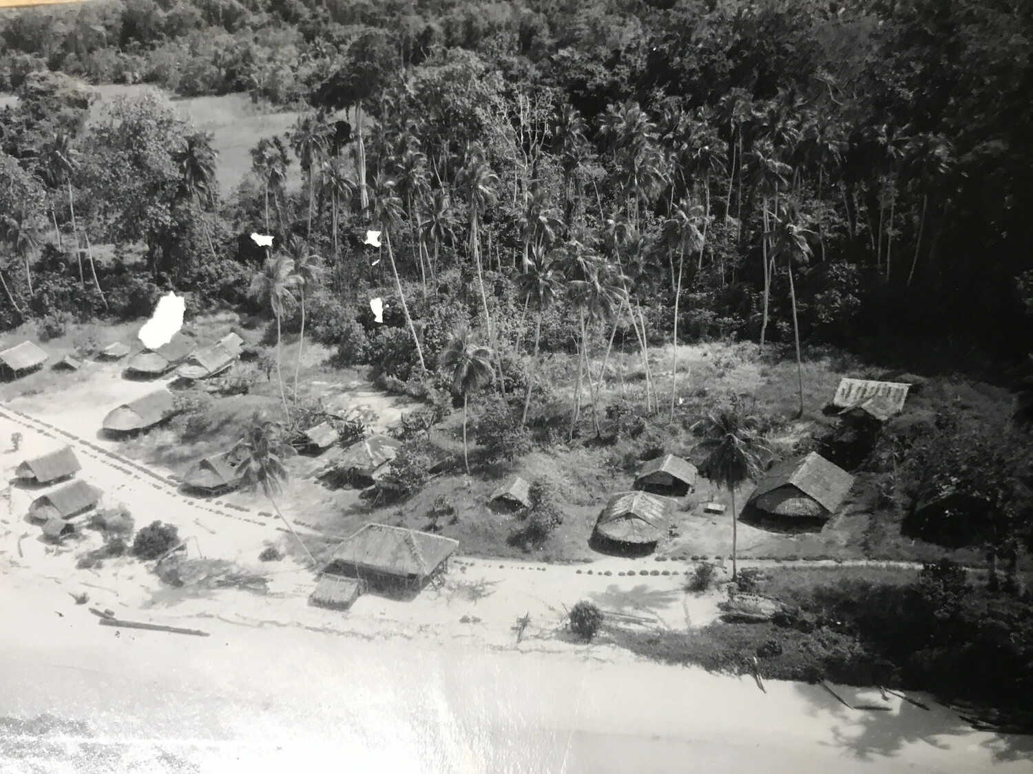 Aerial View of Coastal Native Village, Pacific Theater, WWII, 312th Bomb Group Collection