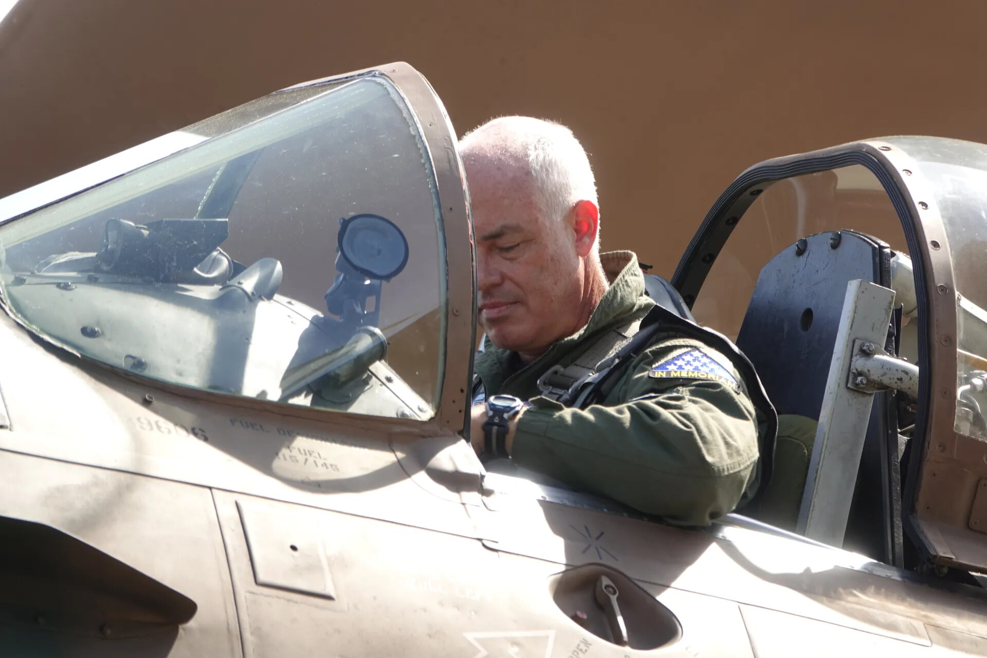 Pilot Seated in Cockpit of Restored A-1 Skyraider at Warbird Reunion Event