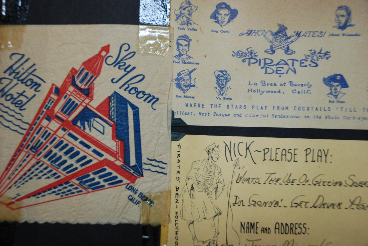 Souvenir Nightclub Napkins/Cards, Hilton Hotel Sky Room (Long Beach) and Pirates' Den (Hollywood), WWII-Era Photo Album (Cushman Collection)