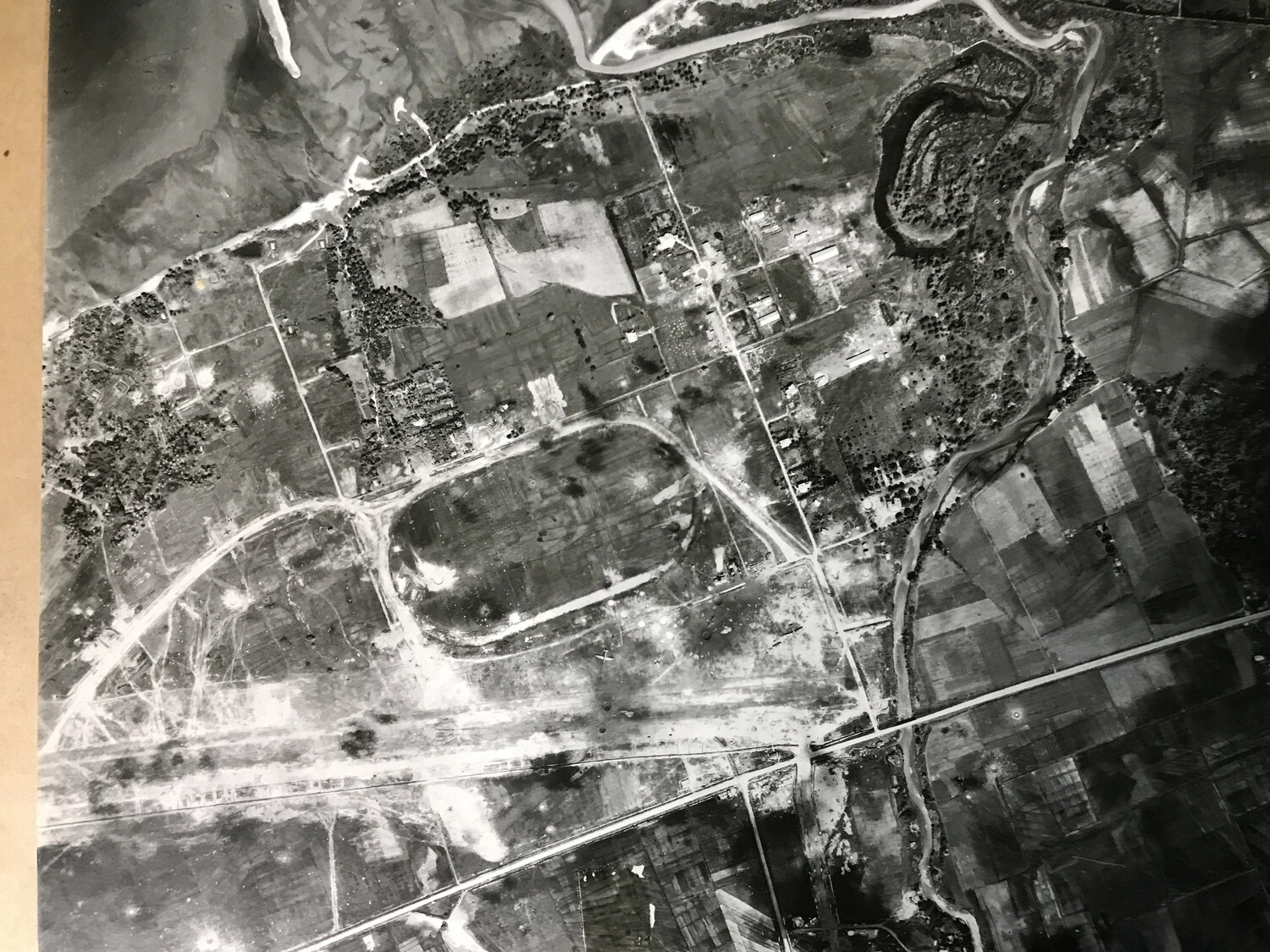 Vertical Aerial Reconnaissance Photograph of Rural Town and Transportation Hub, Pacific Theater, WWII