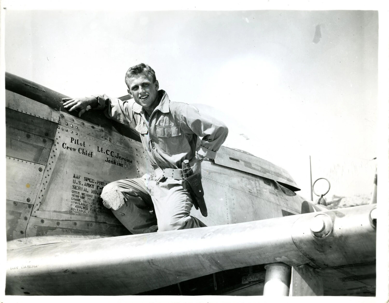 Airman Poses on Wing of P-51/F-6 Mustang with Pilot/Crew Chief Nameplate, WWII
