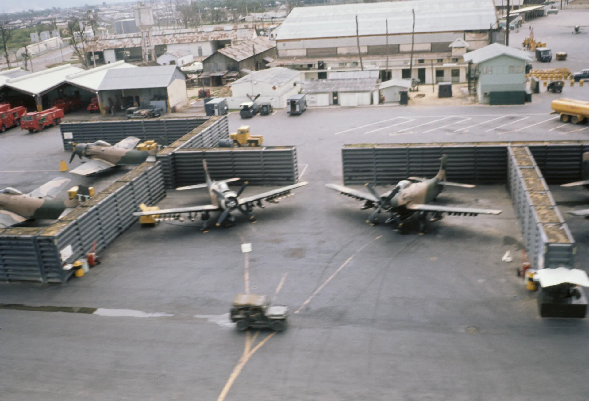 USAF Flight Line with A-1 Skyraiders in Revetments and Jeep on Taxiway, Vietnam War Era