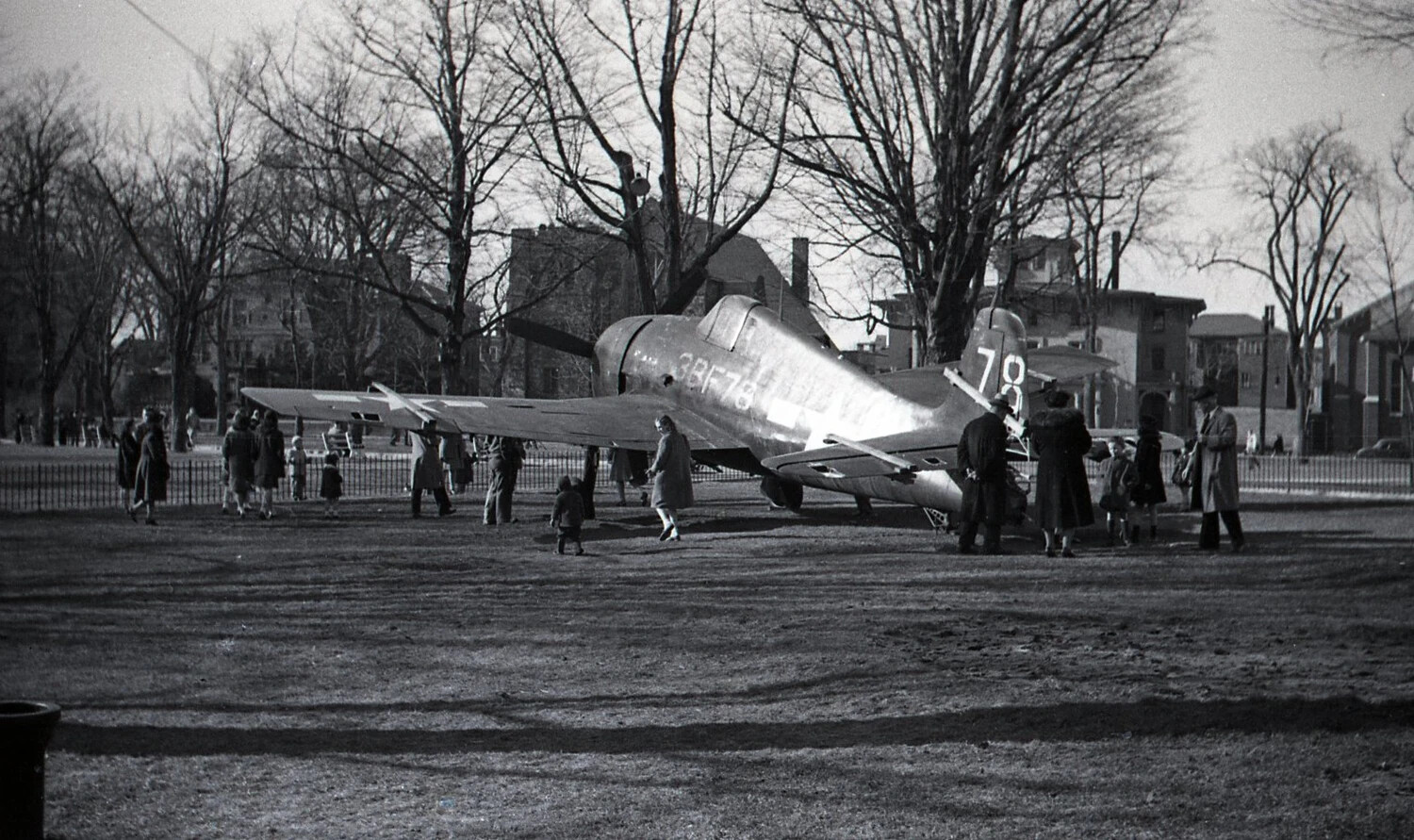 Grumman F6F Hellcat with Crowd of Onlookers, New England Town Green