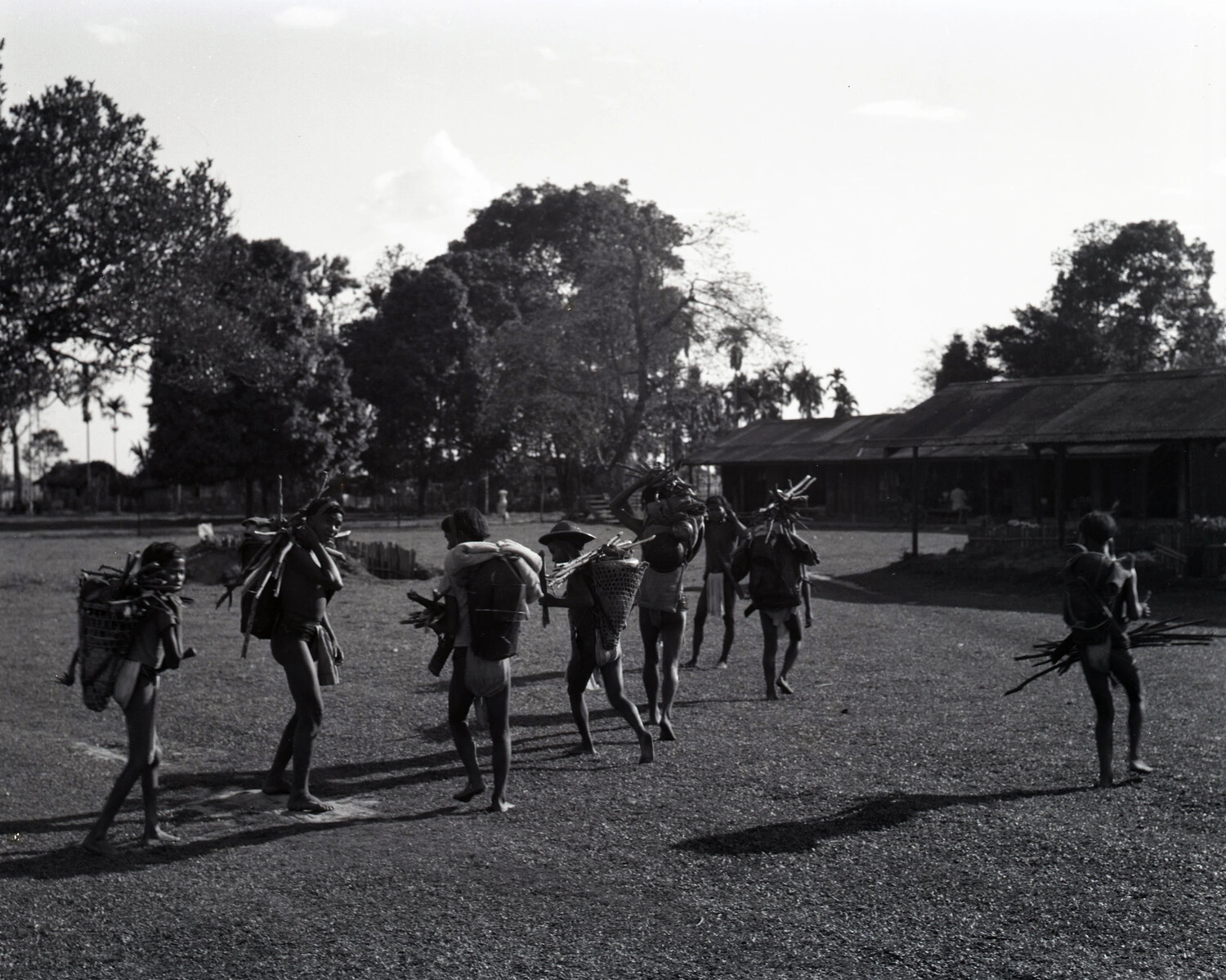 Local Porters Carrying Loads Near Dinjan Airbase, Assam - WWII China-Burma-India Theater Collection