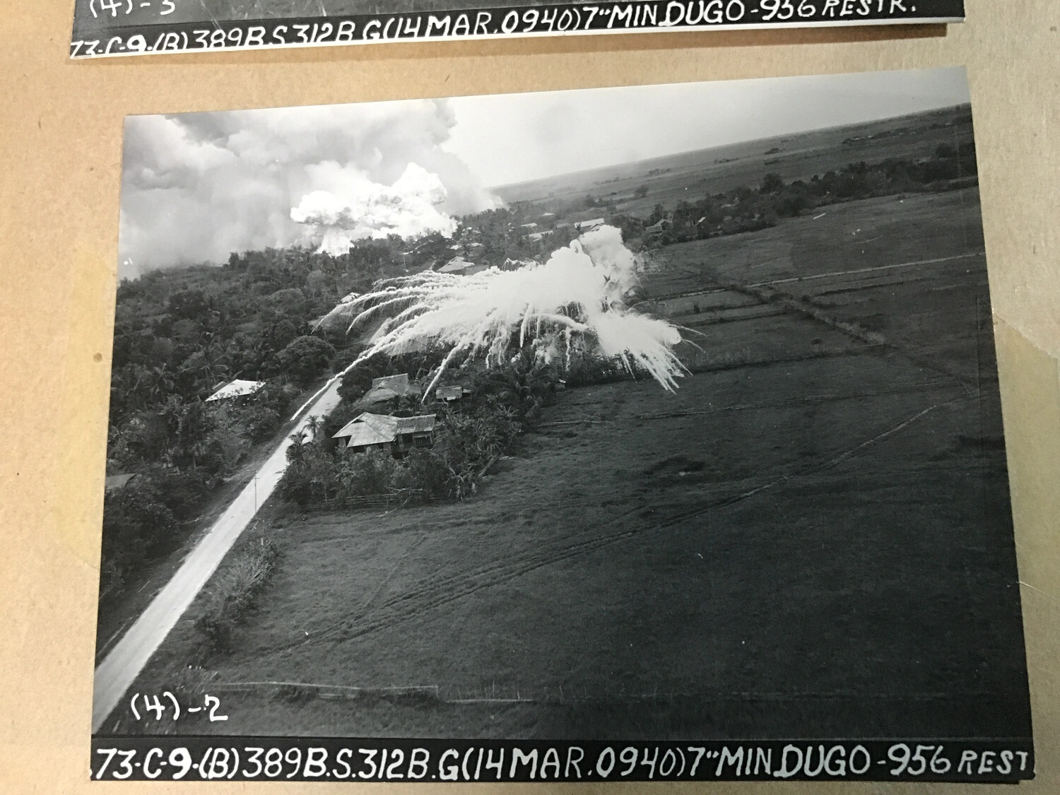 Aerial Strike Photograph of Village Attack Near Dugo, Philippines - 389th Bomb Squadron, 312th Bomb Group