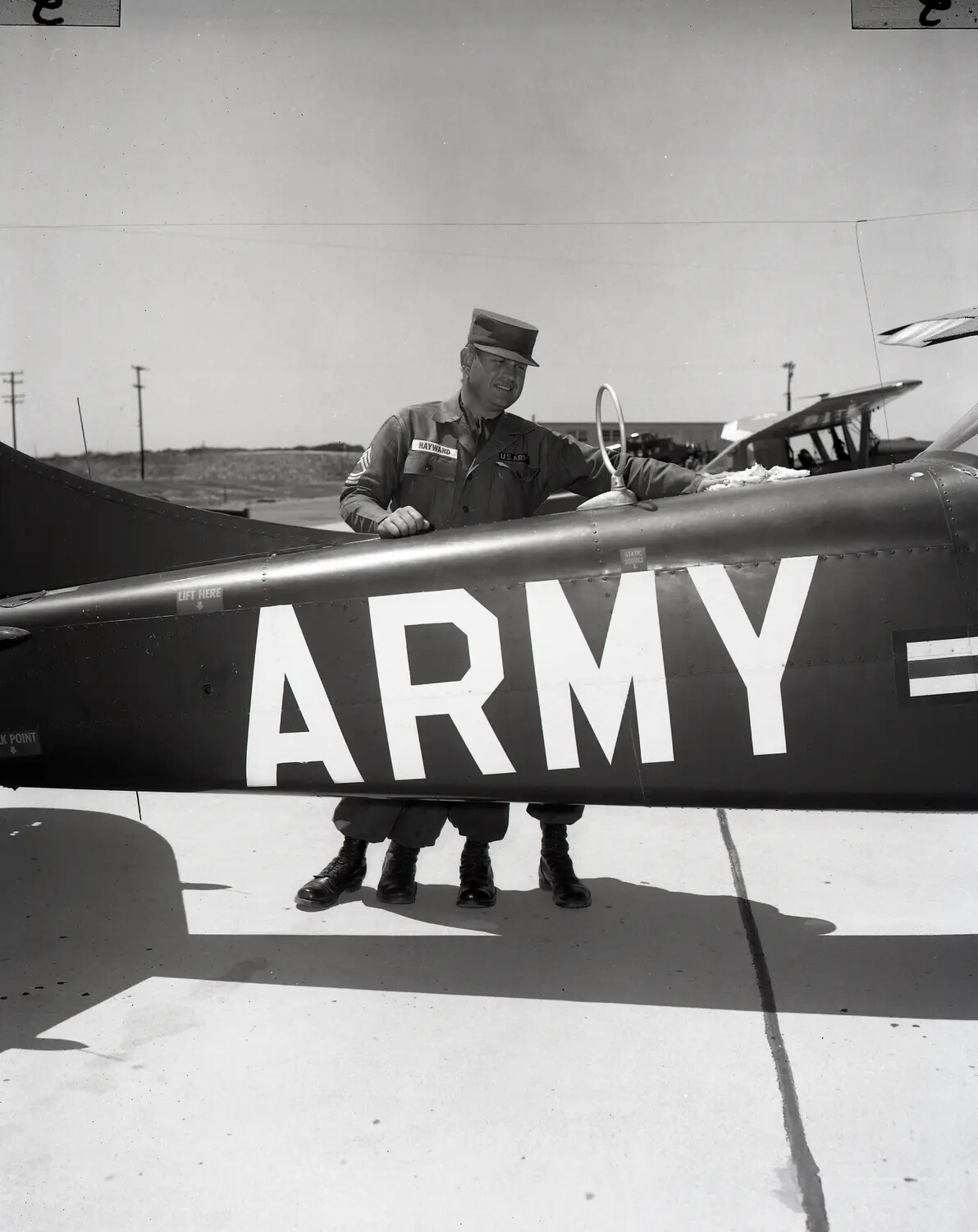Sergeant Hayward with U.S. Army L-19/O-1 Bird Dog Liaison Aircraft, National Guard Flight Line