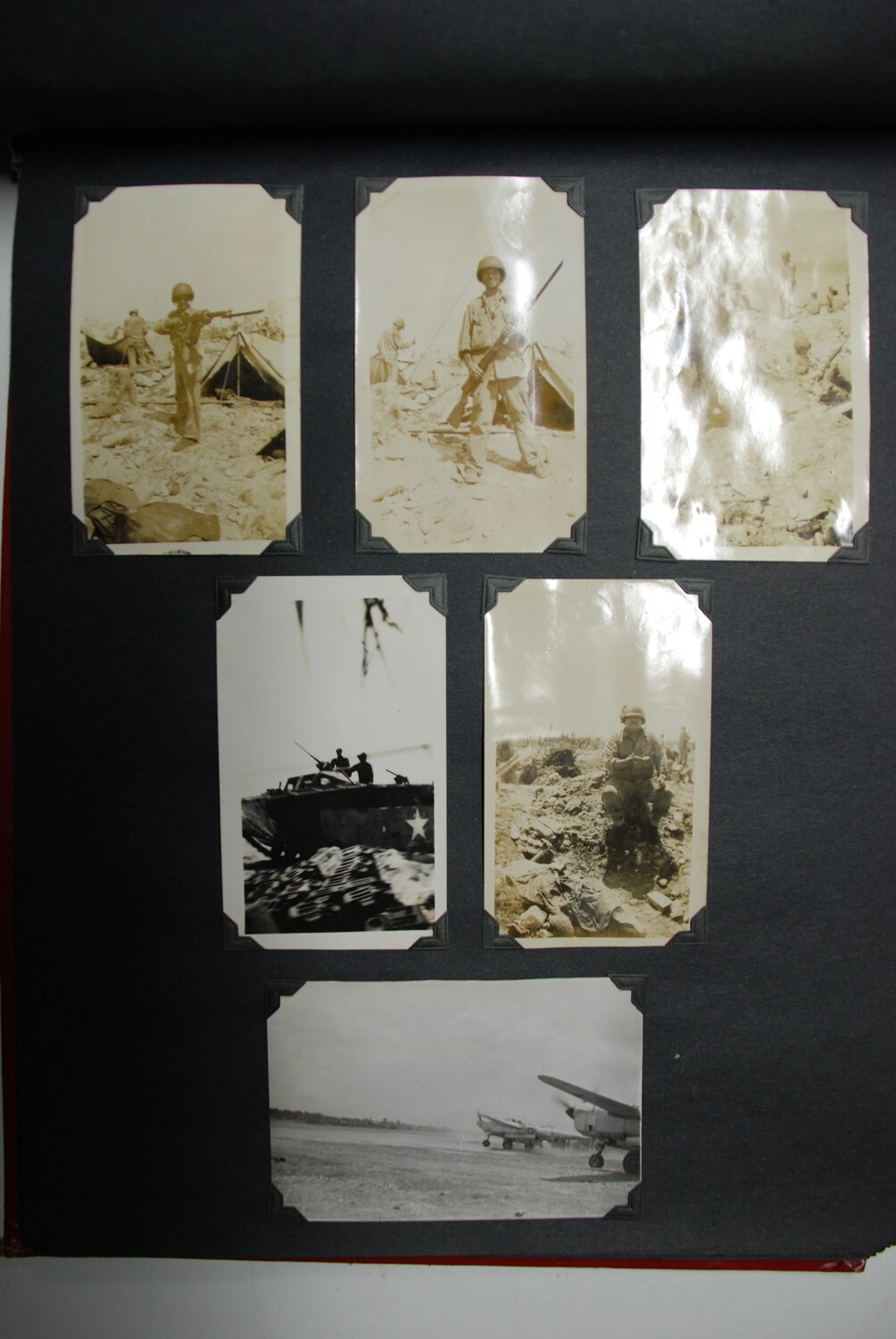 Album Page of Six Snapshots -- Infantry with Fixed Bayonets, LVT Amtrac, and Twin-Boom Fighters, Jack T. Kelley Album