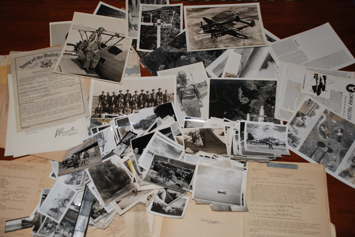 Overview of Assorted WWII China-Burma-India Theater Photographs and Documents Spread for Cataloging