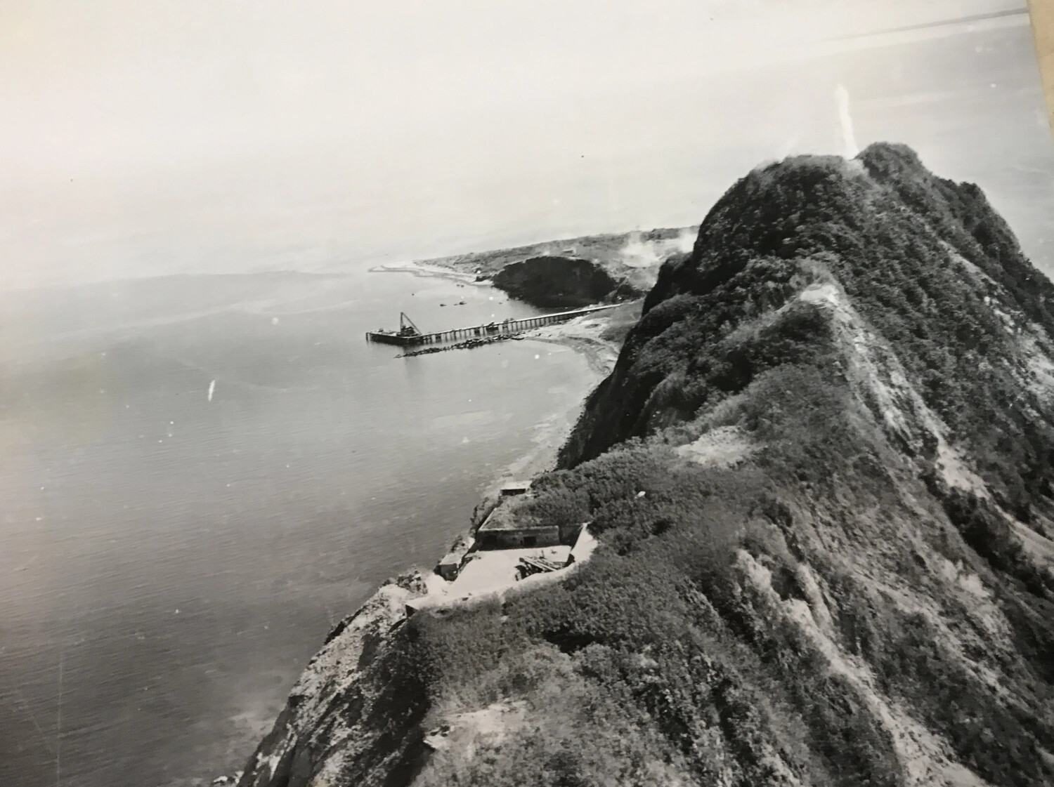 Aerial Photograph of Fortified Coastal Headland and Pier, Pacific Theater, Possibly Corregidor (Full Frame)