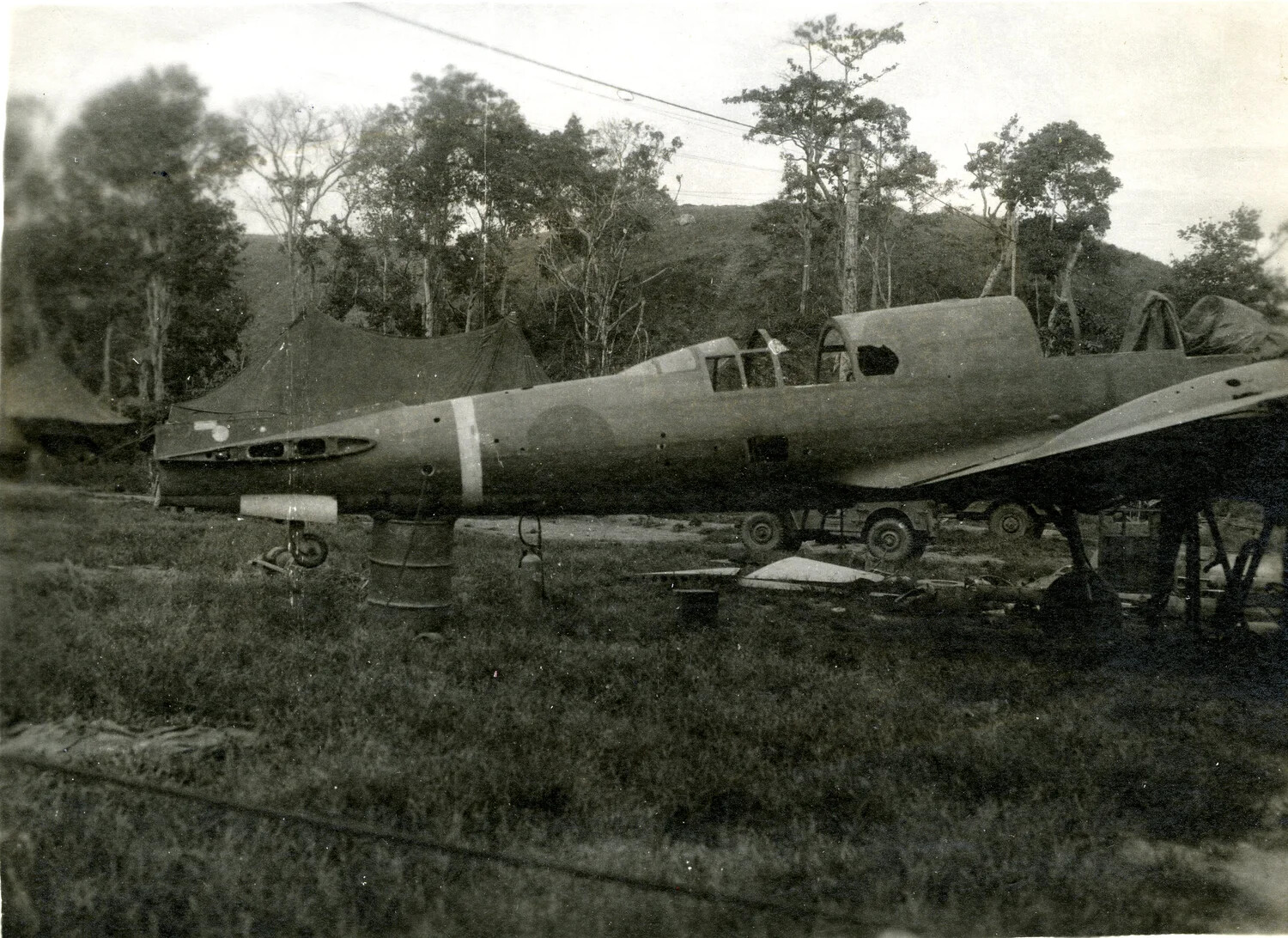 Captured Japanese Fighter Aircraft Under Technical Examination, Southwest Pacific Theater, WWII