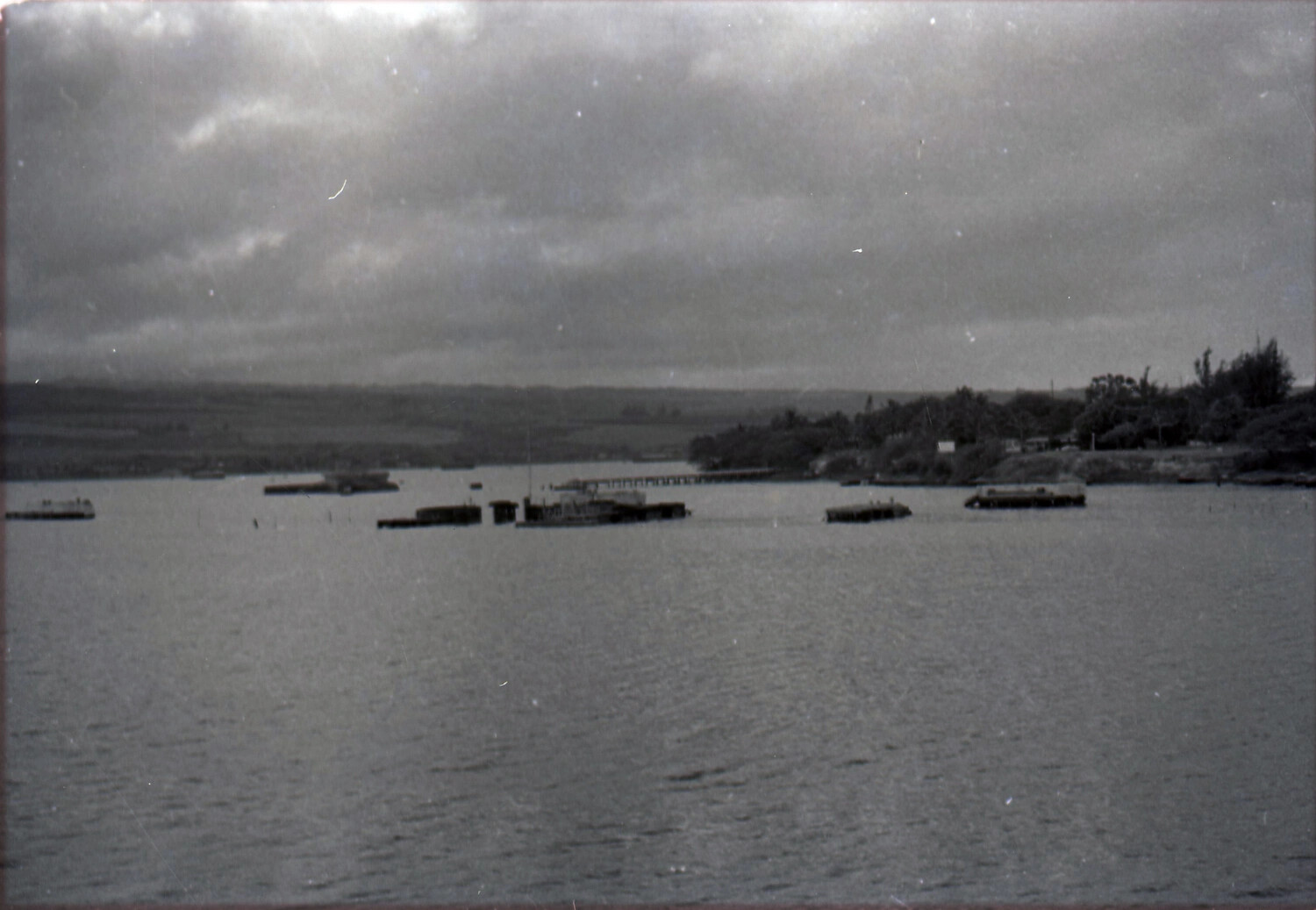 Harbor View with Floating Mooring Structures, Possibly Pearl Harbor Vicinity, 1954
