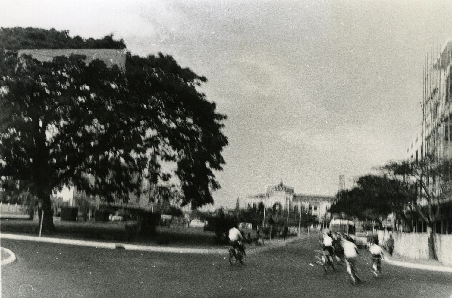 Street View of Phnom Penh Boulevard with Cyclists, Cambodia