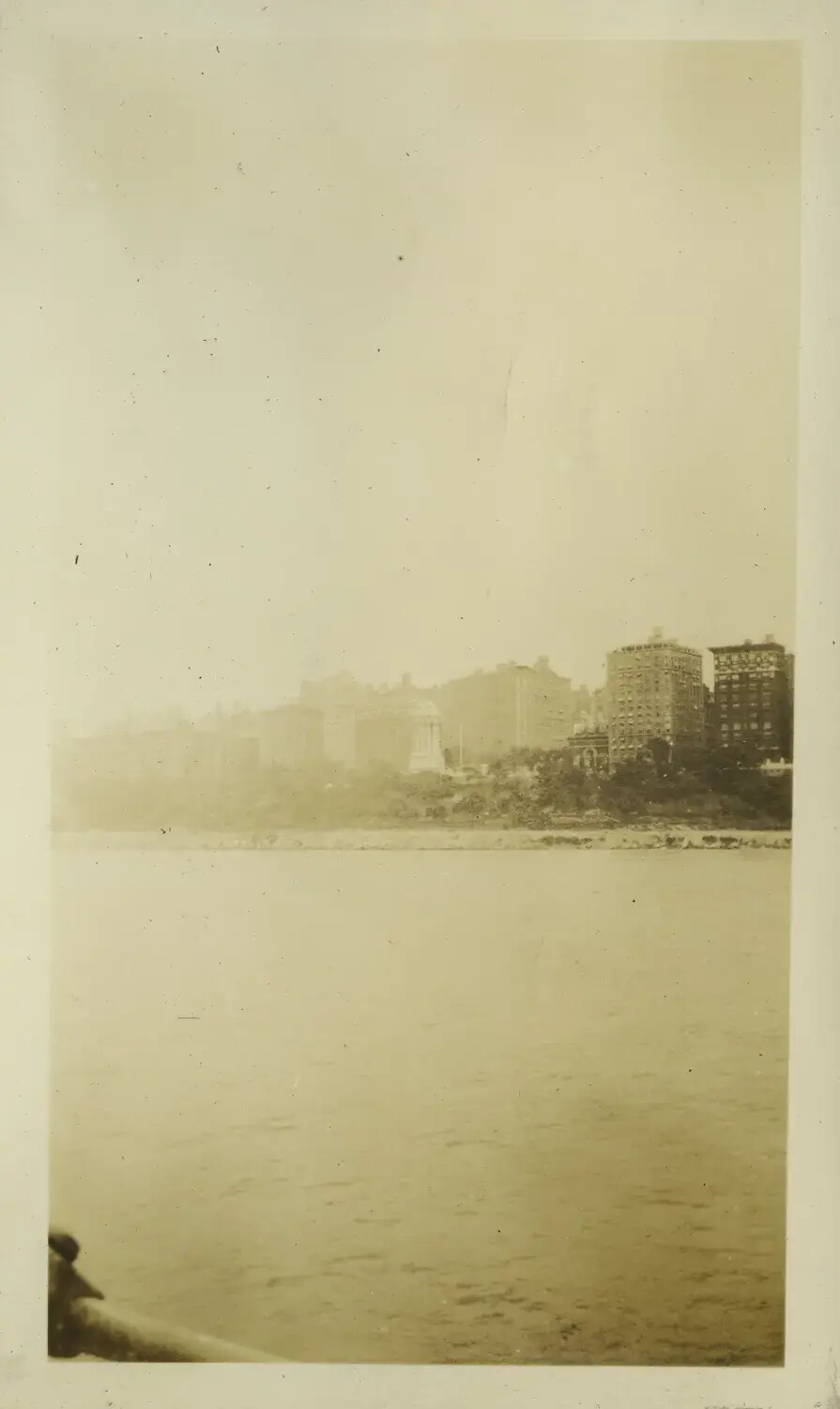 View of Urban Shoreline from Ship's Deck, USS Maryland Photo Album, 1930s