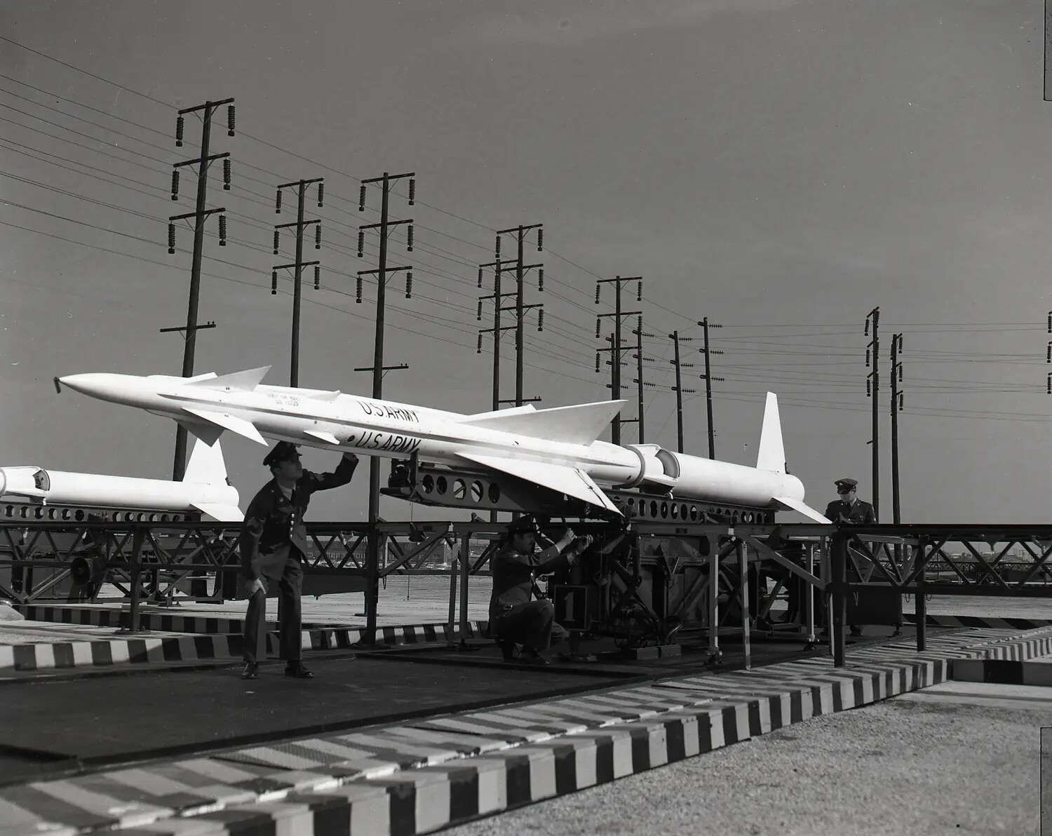 Army Officer Inspecting a Nike Missile on Its Launcher Rail
