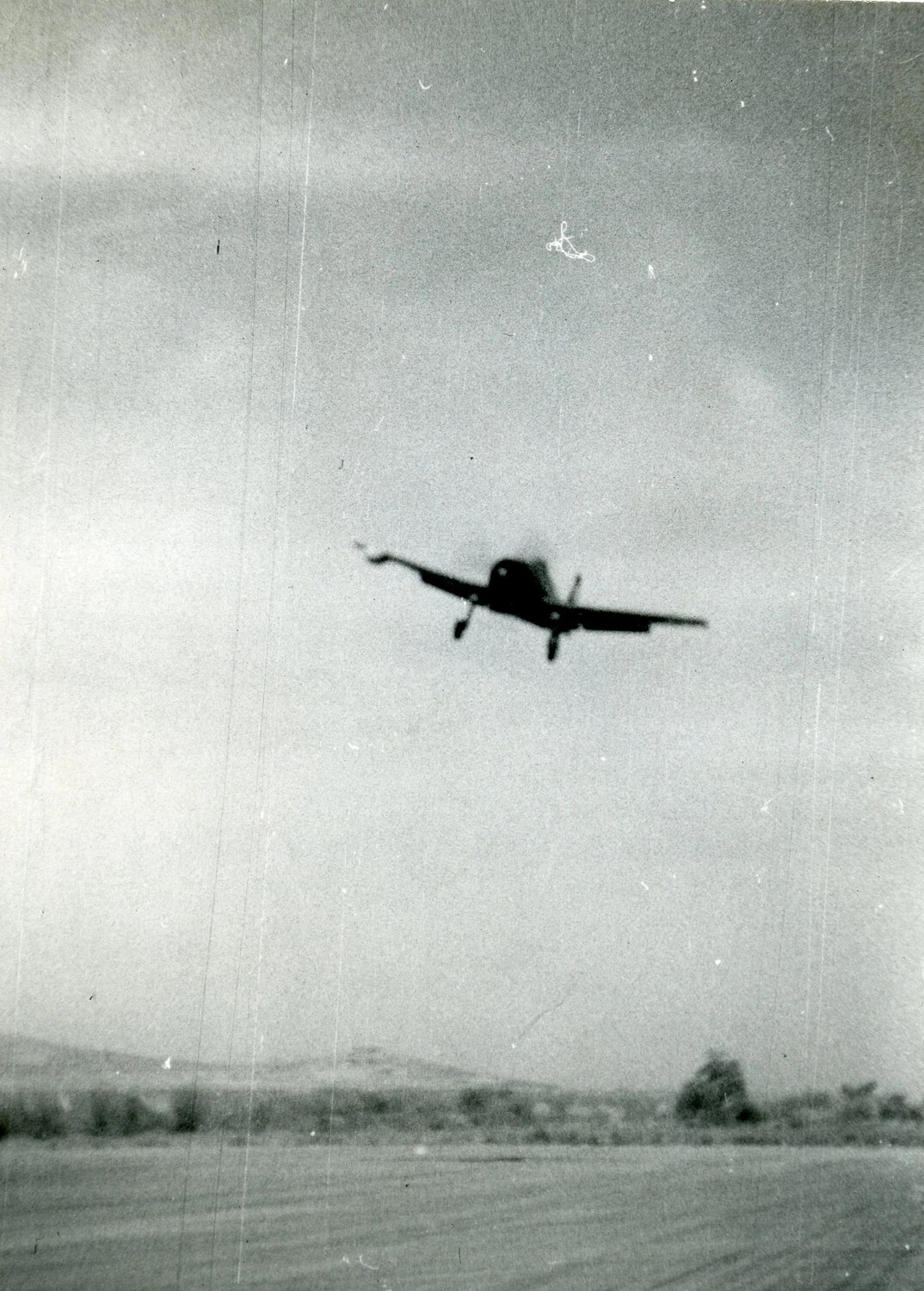 Fighter Aircraft Climbing After Takeoff, VMF-214 Album, 1945