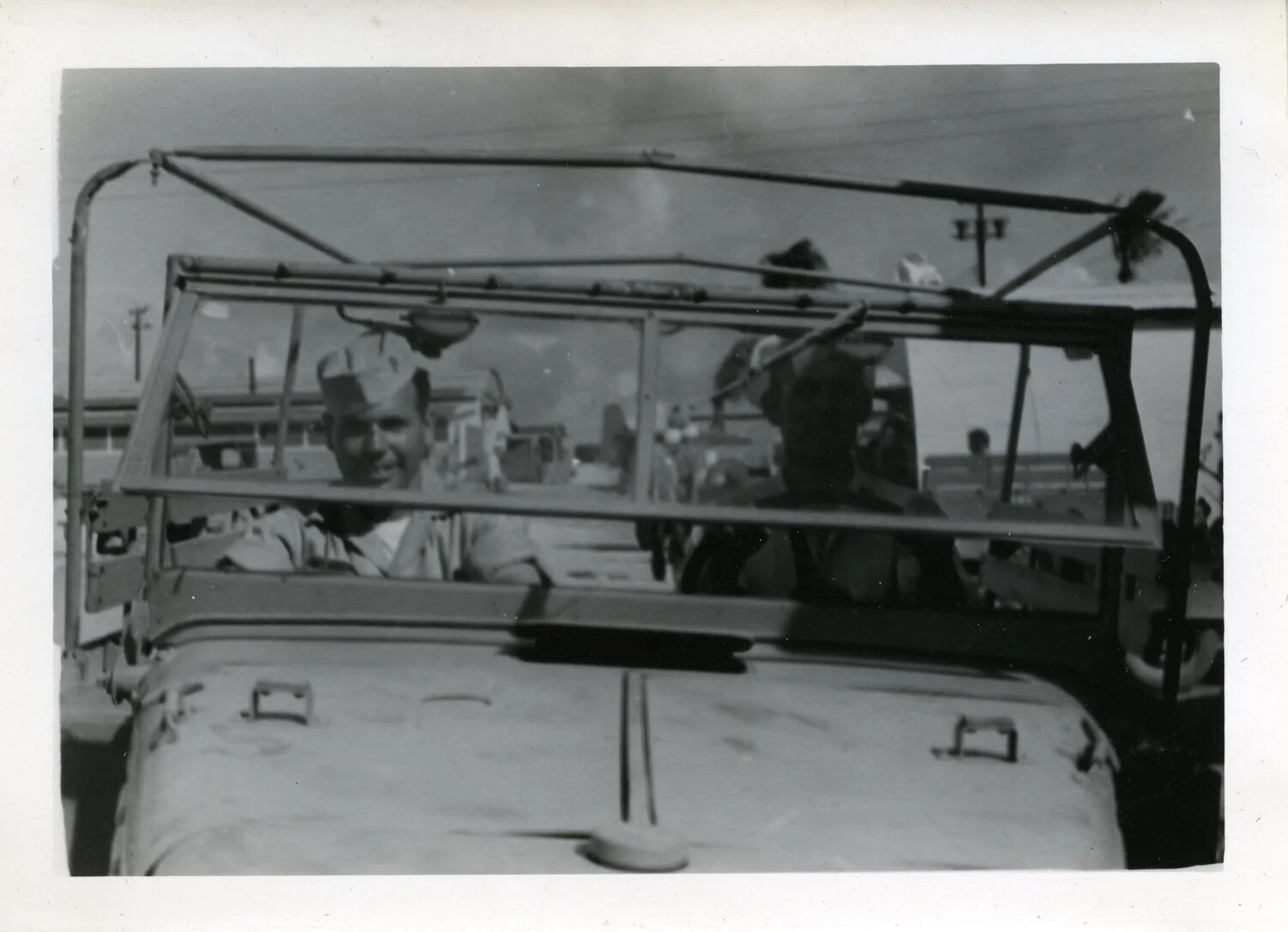 Servicemen Riding in a Jeep at NAS Agana, Guam — VR-6 Photo Album