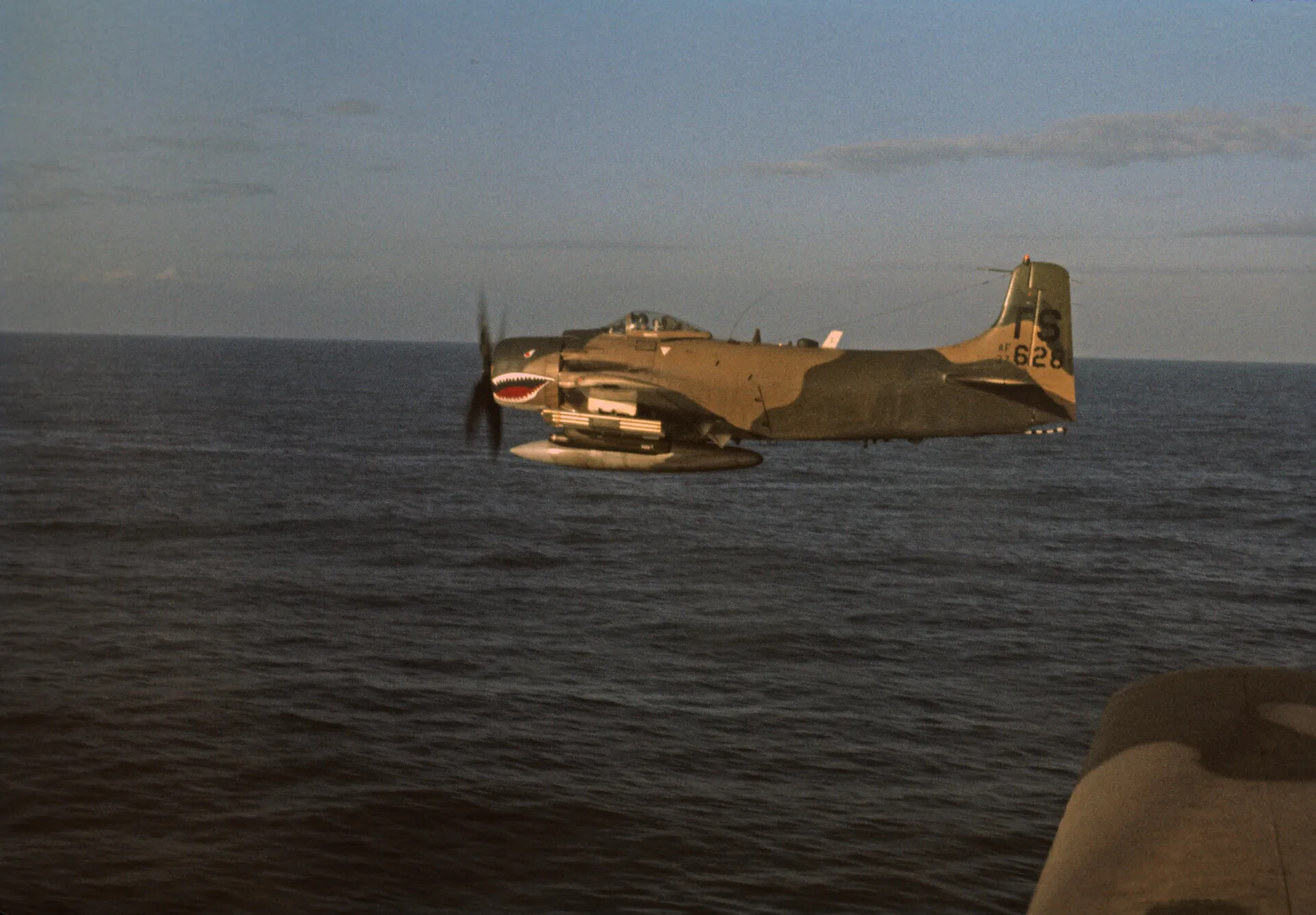 USAF A-1 Skyraider in Flight Over Open Water, Southeast Asia, 1969
