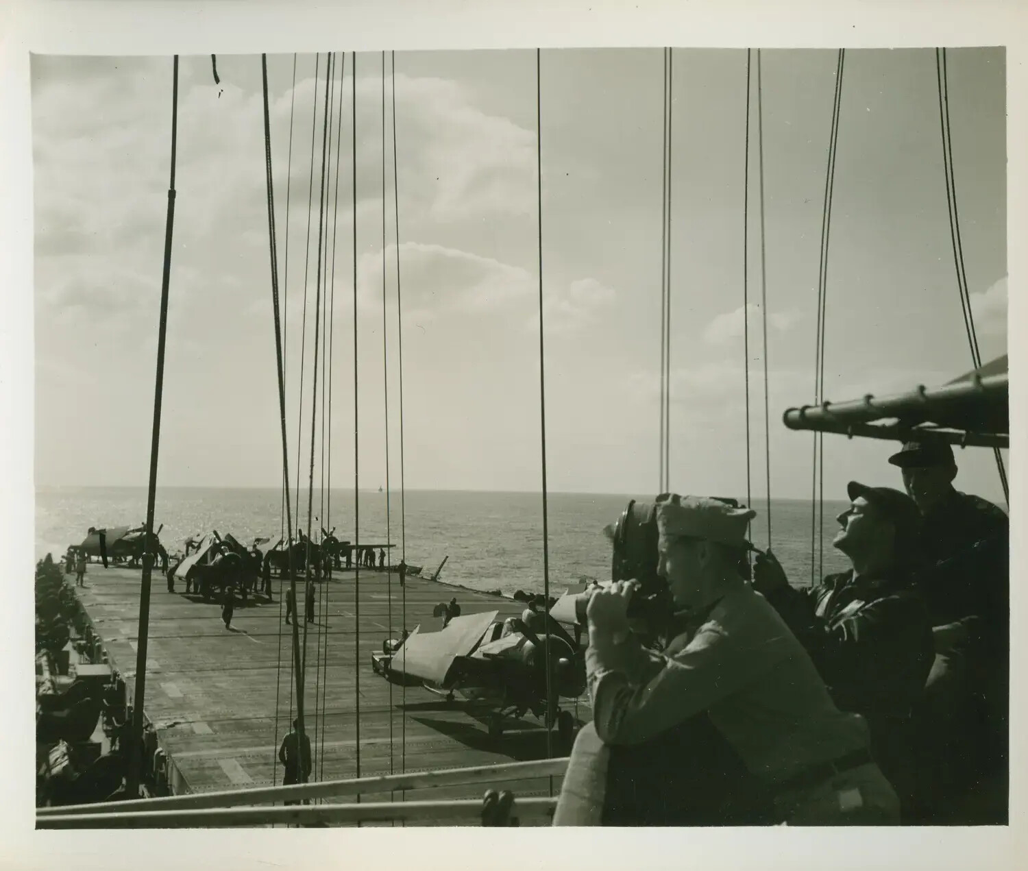 Officers Observing Flight Deck Operations Aboard USS Petrof Bay (CVE-80)
