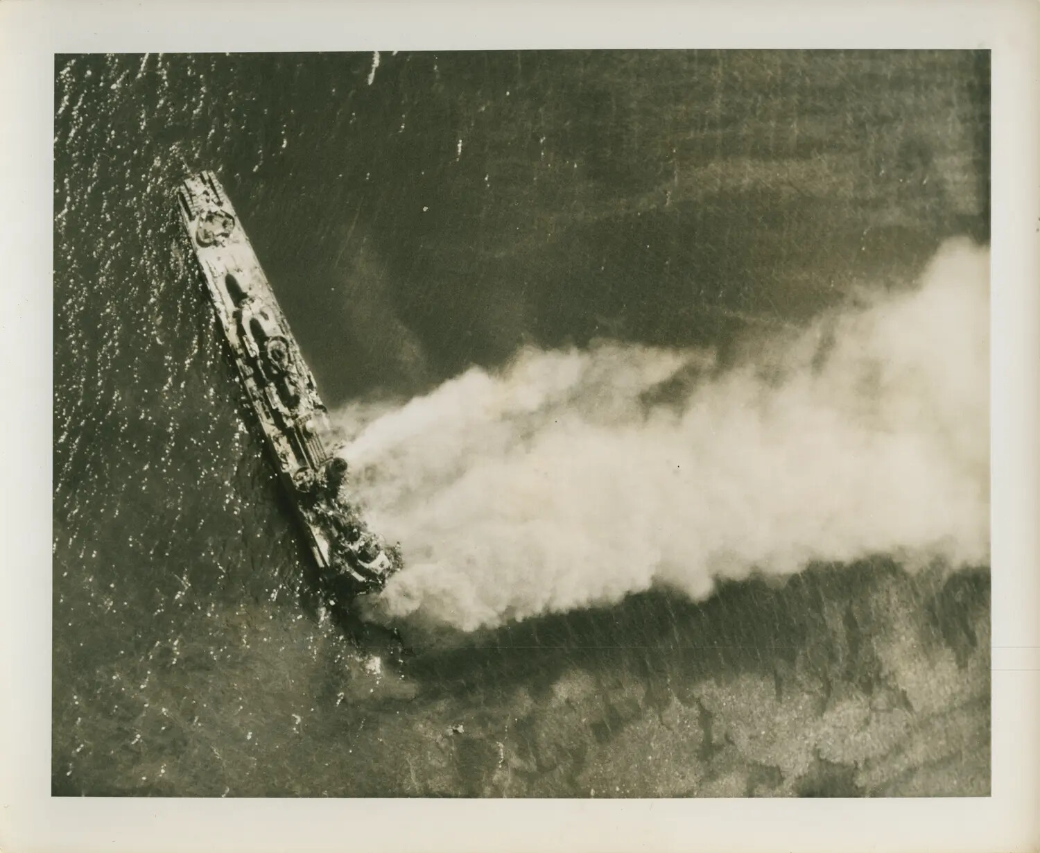 Aerial View of U.S. Navy Destroyer Laying Smoke Screen, Pacific Theater, WWII (Petrof Bay Task Group Collection)
