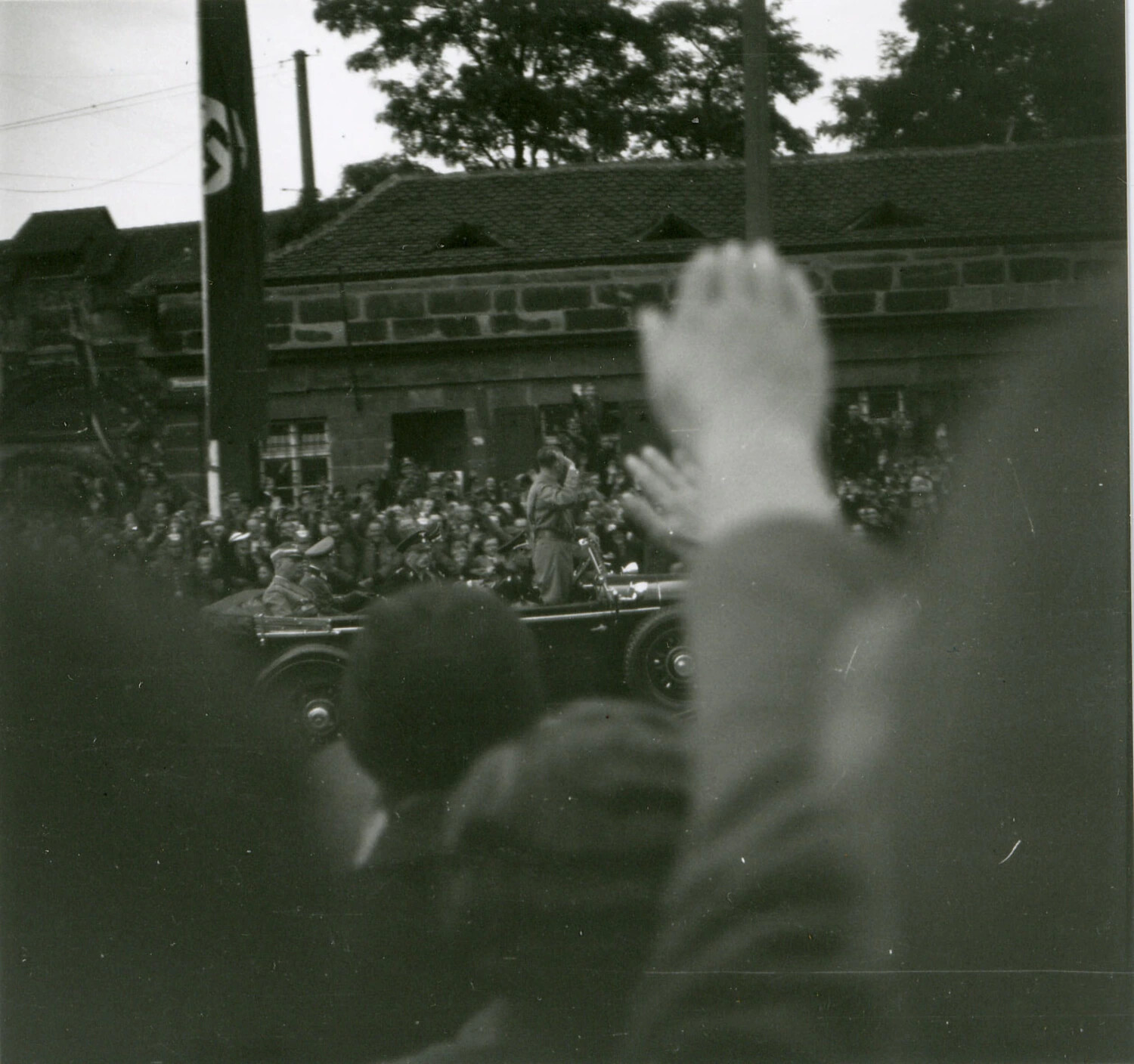 Crowd Saluting Passing Motorcade with Nazi Officials, 1930s Germany