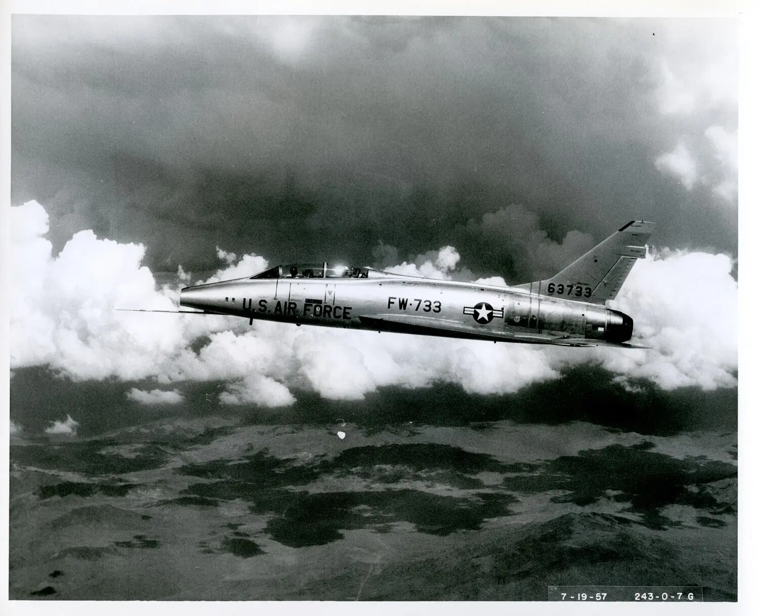 North American F-100 Super Sabre in Flight Above Clouds, USAF Serial 63733 / FW-733, Dated 7-19-57