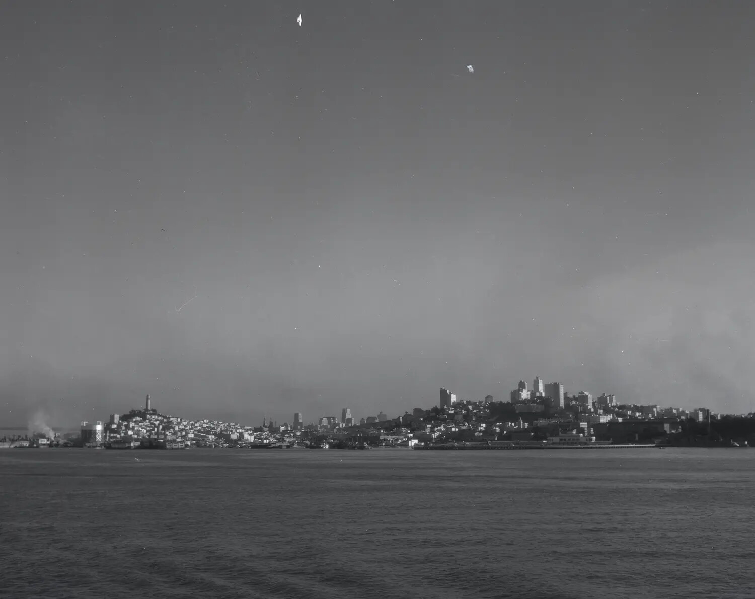 City Skyline Viewed from the Deck of a Naval Vessel, Possibly San Francisco Bay