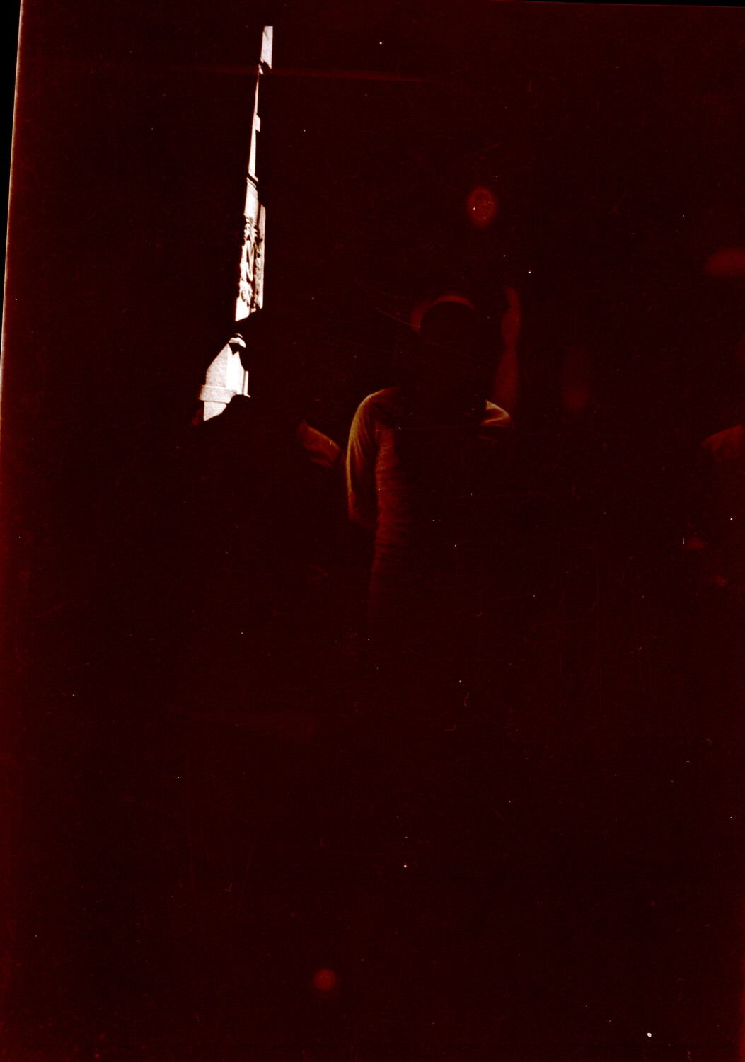 Unprocessed Negative Scan: Silhouetted Figure and Illuminated Pole/Mast, Pre-WWII China (US Navy Collection)