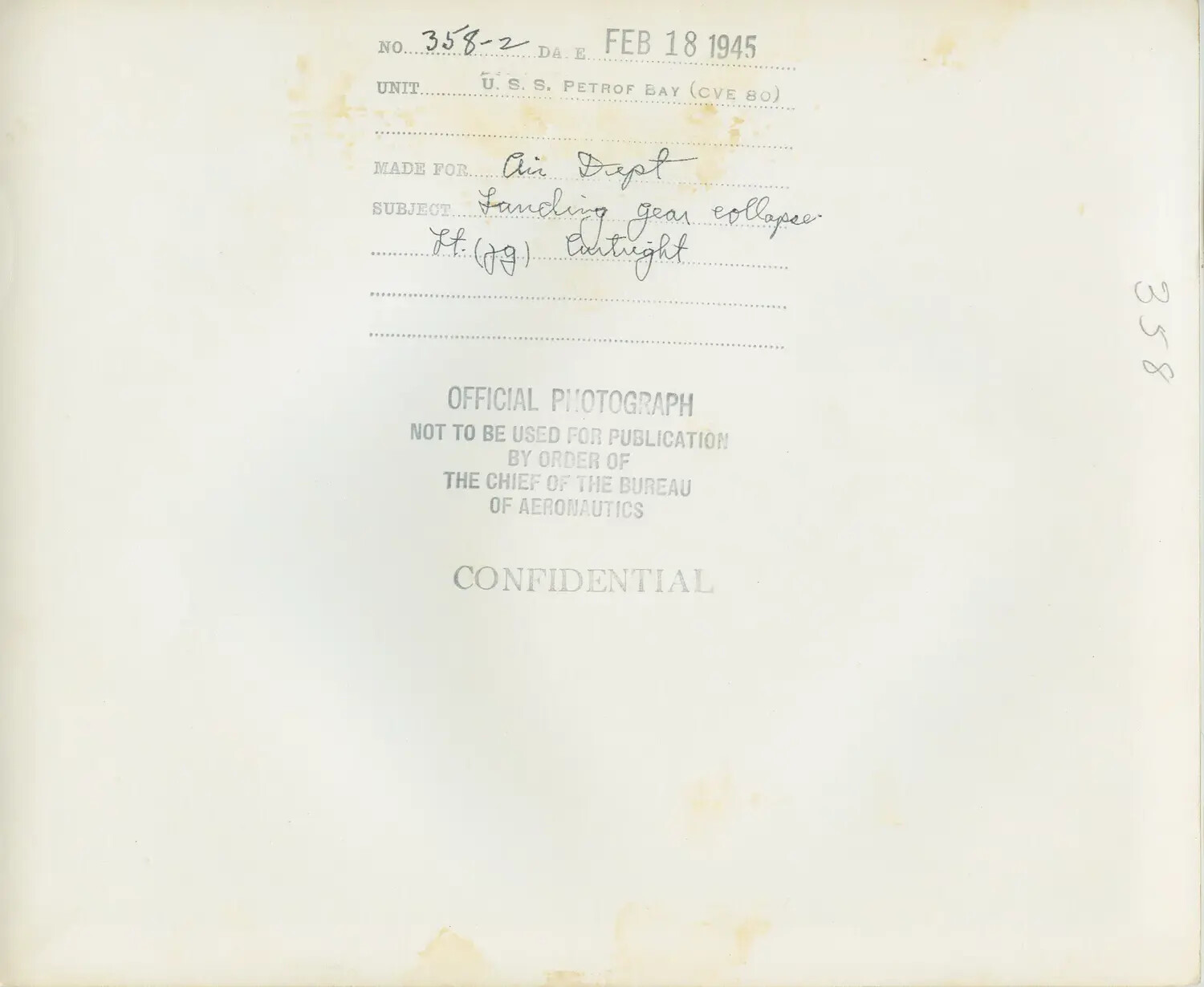Verso/Caption Sheet, USS Petrof Bay (CVE-80) Landing Gear Collapse Incident Photo, 18 February 1945
