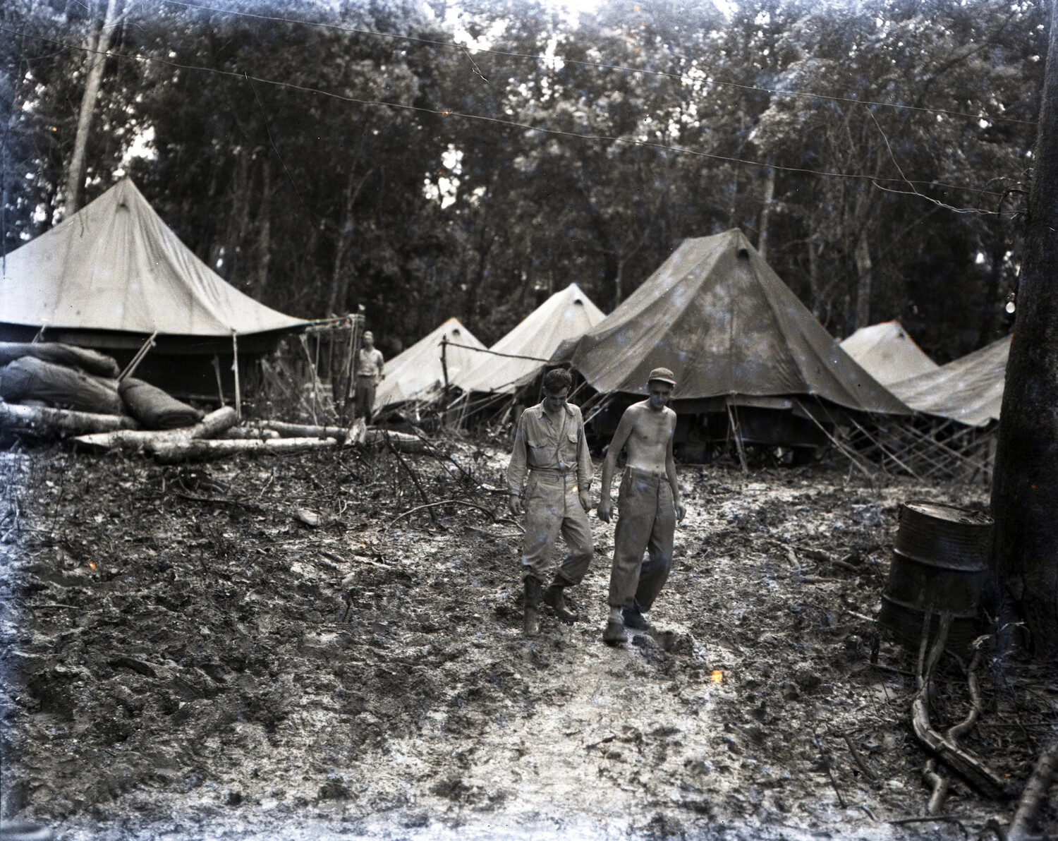 Soldiers Walking Through Muddy Jungle Camp, CBI Theater, WWII