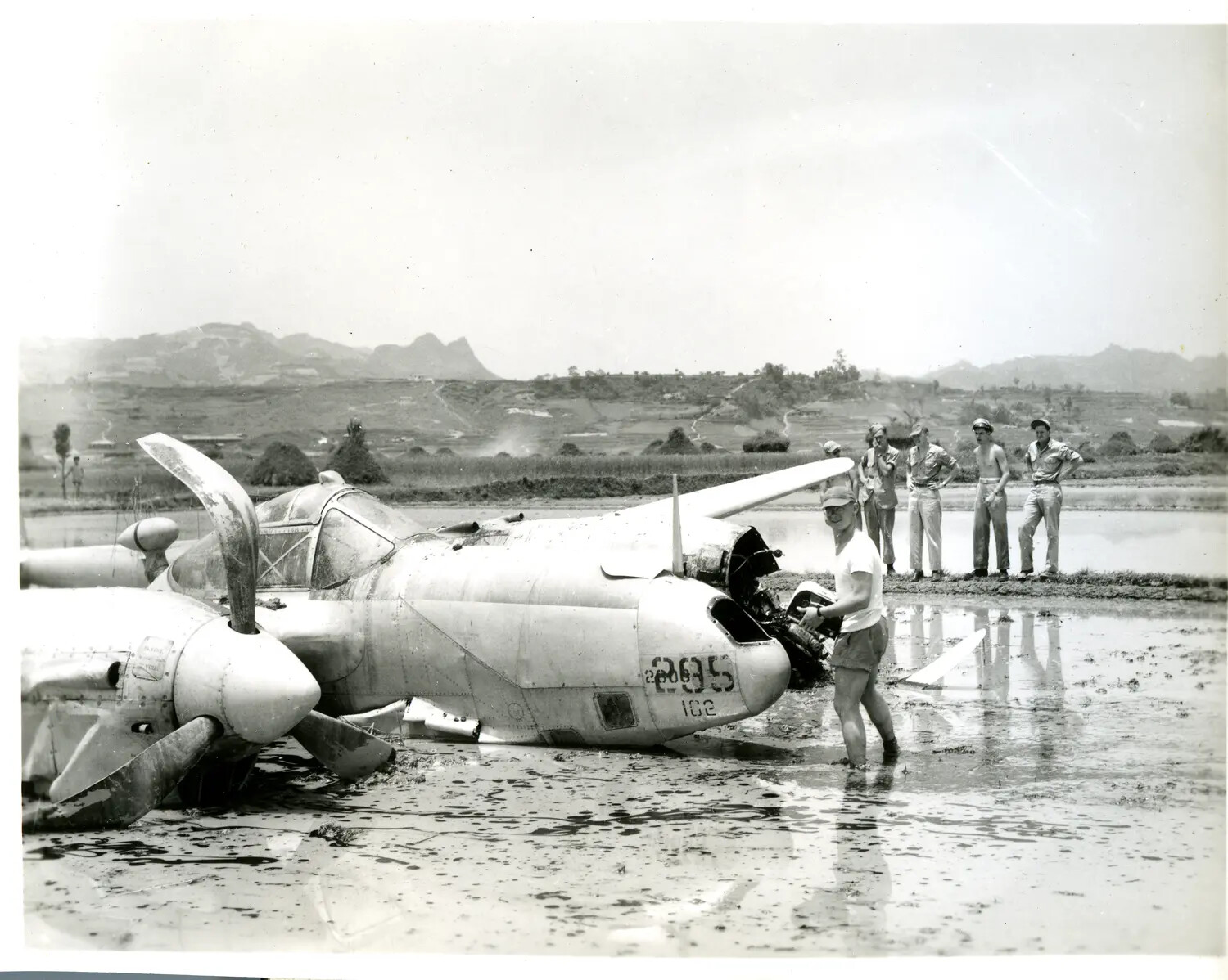 Crash-Landed USAAF Twin-Engine Aircraft in Flooded Rice Paddy, China-Burma-India Theater, WWII