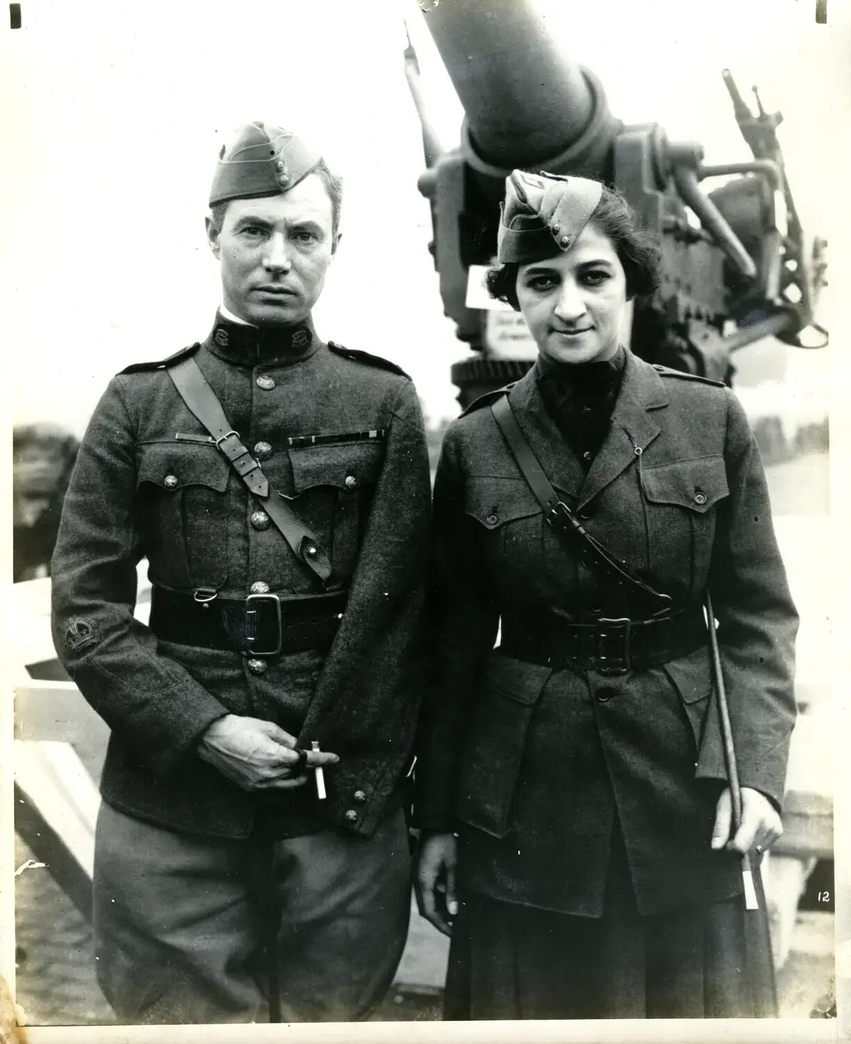 Uniformed Man and Woman in Close Portrait Before Trophy Gun, WWI War Exposition, [Cincinnati, Ohio], 1918 (Companion to Image No. 11)