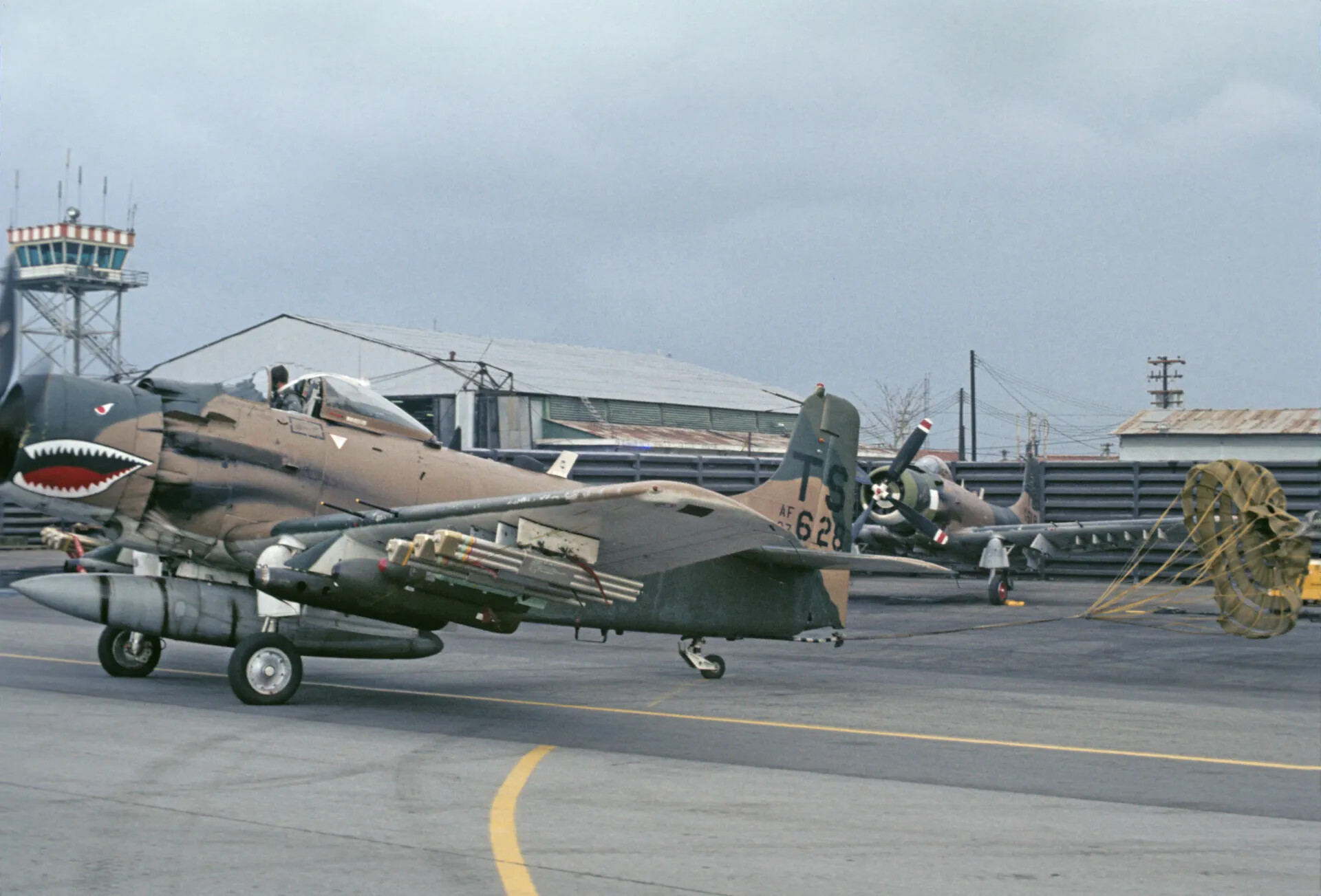 A-1 Skyraider 'TS-628' Landing with Drag Chute Deployed, Shark's-Mouth Nose Art — Don Engebretsen Slide Collection