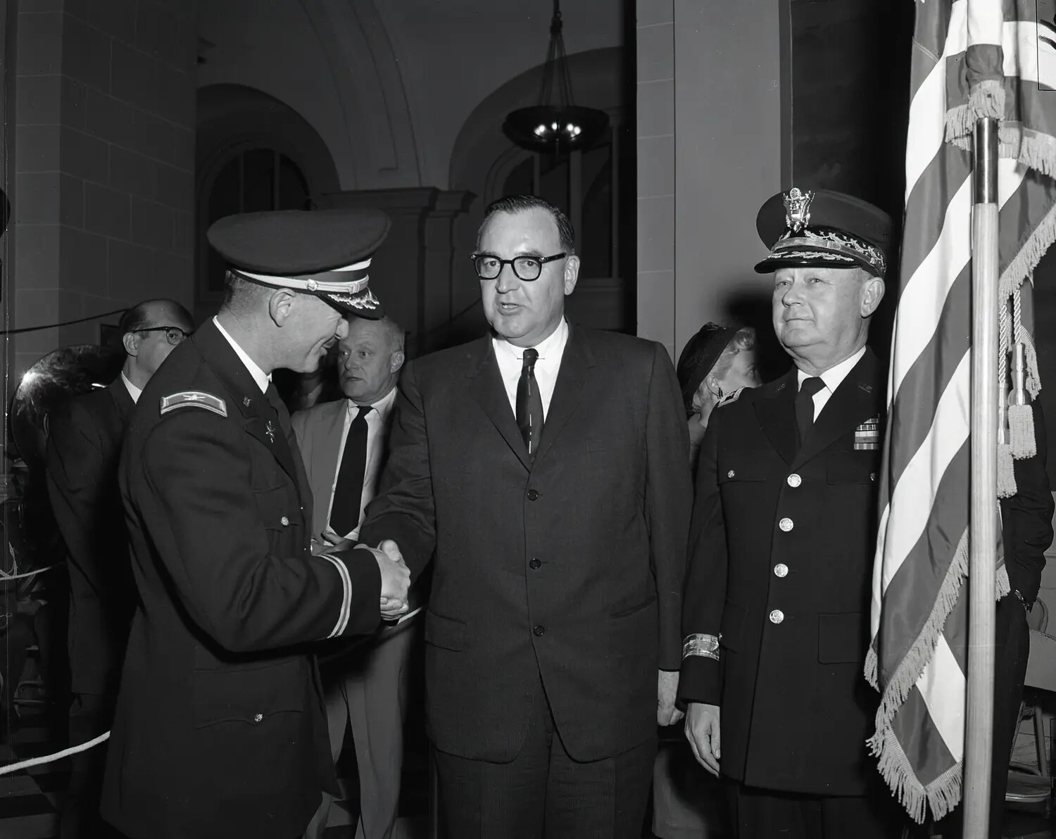 National Guard Officers Greet Civilian Dignitary, Likely Governor Edmund G. 'Pat' Brown, at 1959 Inauguration