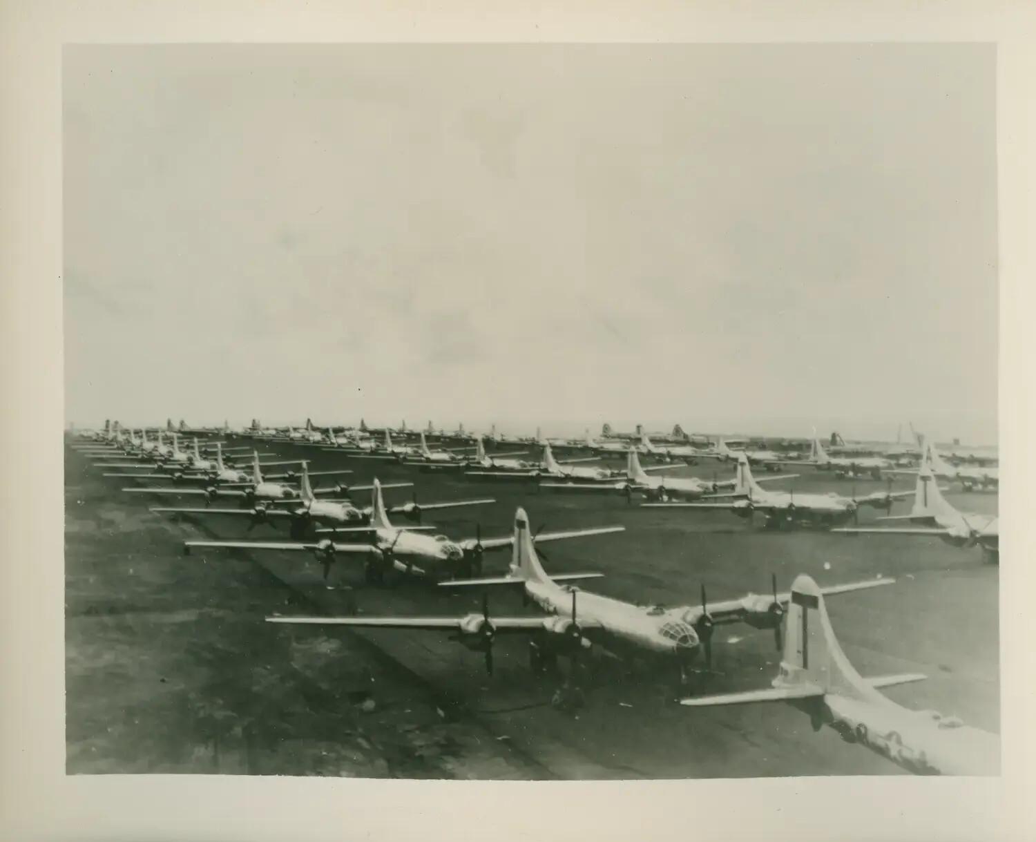 Rows of B-29 Superfortress Bombers Parked on Airfield Flight Line, Pacific Theater (probable Marianas base), World War II