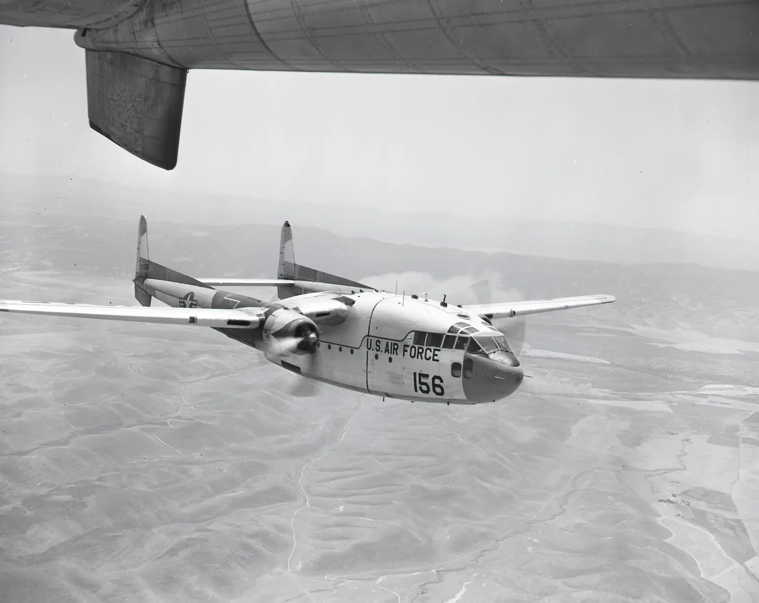 Fairchild C-119 Flying Boxcar in Formation Flight, Side View