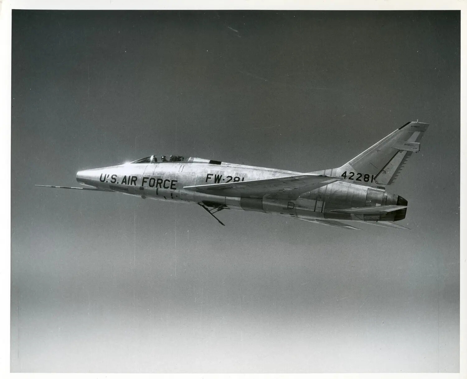 North American F-100 Super Sabre (Tail Number FW-281 / 42281) in Flight - USAF Publicity Photograph