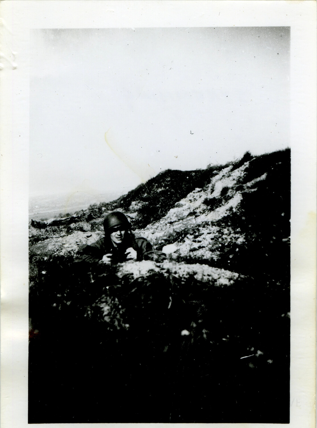 American Soldier in Snow-Dusted Foxhole Position Overlooking a Valley, Ardennes Campaign, Winter 1944-45