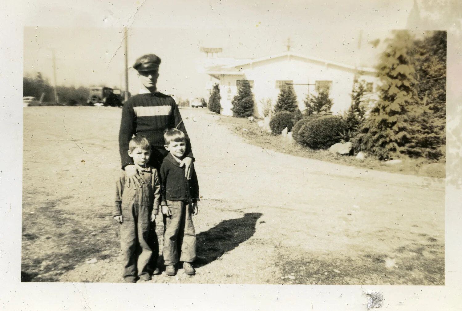 Man and Two Boys Posed on a Residential Road, Stateside Snapshot, WWII Era