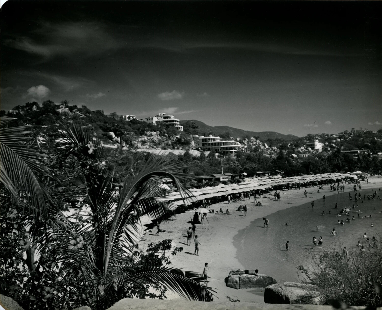 Overlook View of Acapulco Beach and Hillside Resorts, 1949