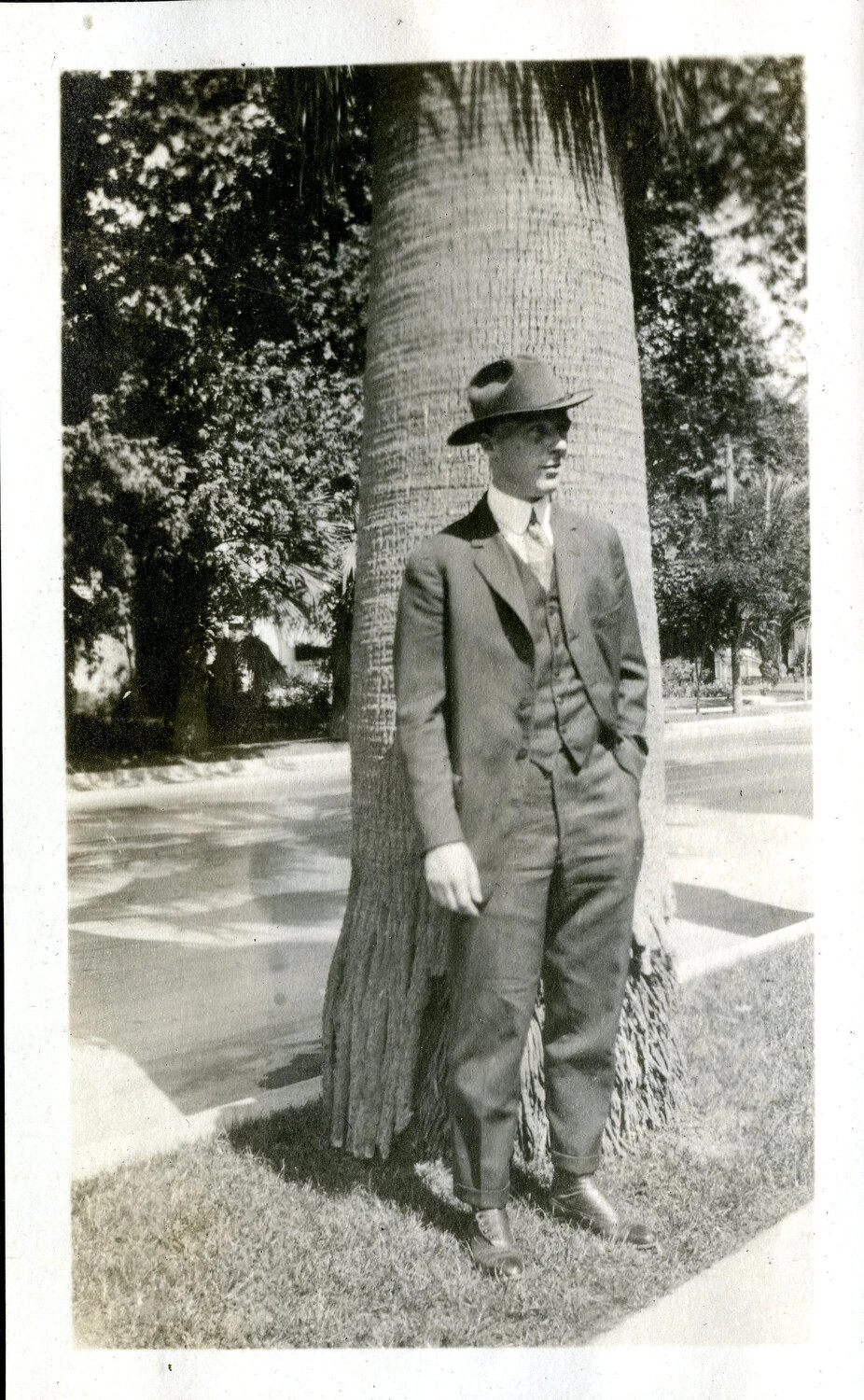 Young Man in Suit and Fedora Beside a Palm Tree, Southern California or Florida Streetscape, c. 1918-1922