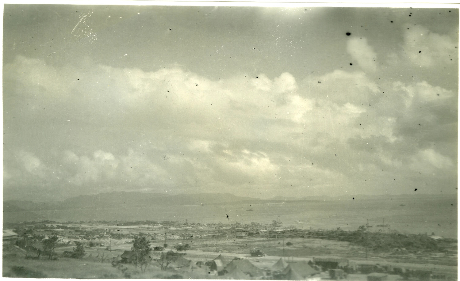 Aerial/Elevated View of Tent Camp and Bay, Okinawa