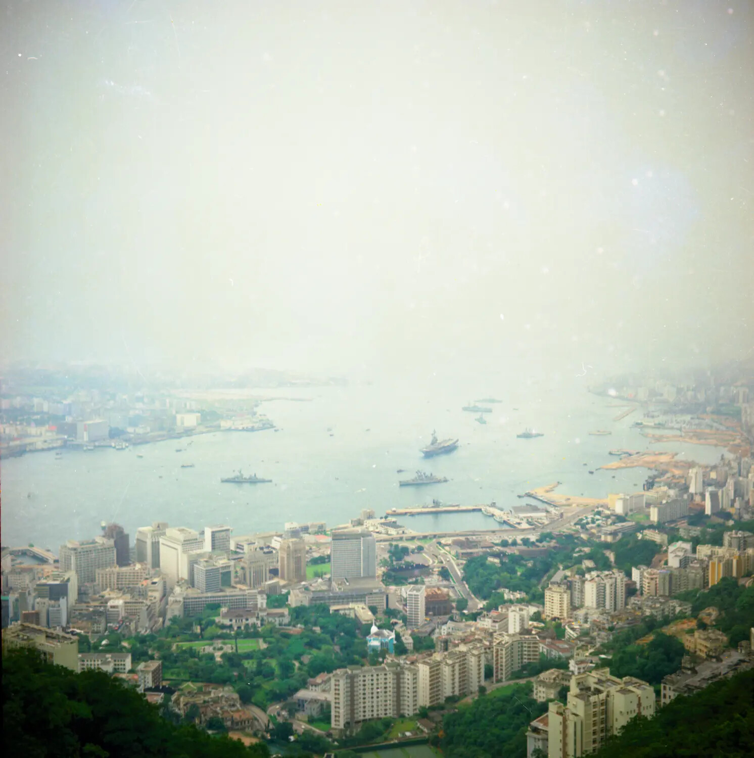 Aerial View of Victoria Harbour with U.S. Navy Carrier at Anchor, Hong Kong, Vietnam War Era