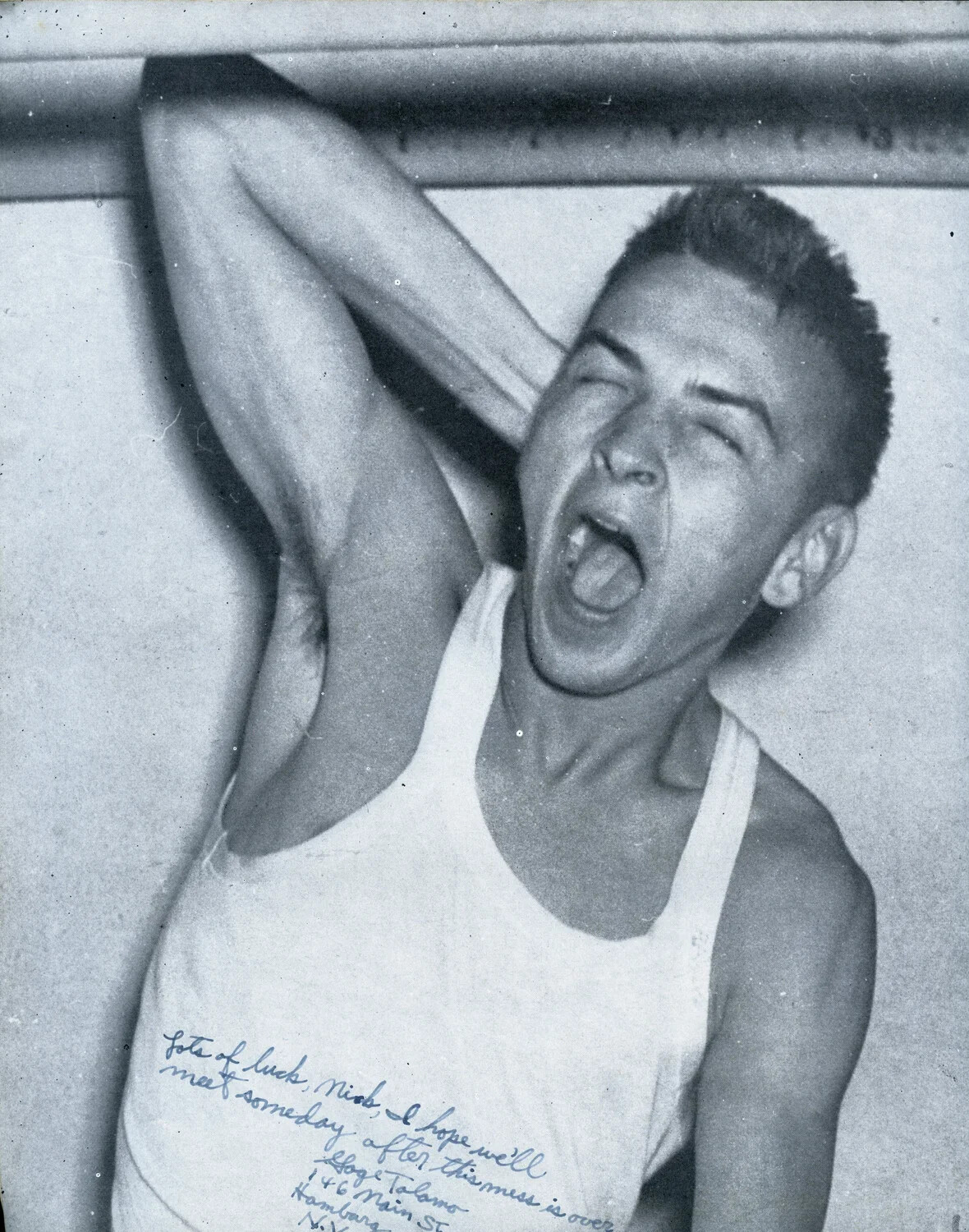 Candid Barracks Photograph of Aviation Cadet Yawning/Stretching, with Handwritten Inscription, Preflight Class 44-F Booklet