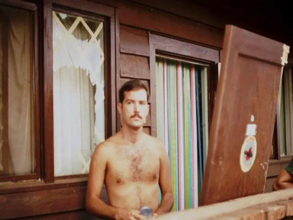 Off-Duty Serviceman on Barracks Porch, Vietnam War Era
