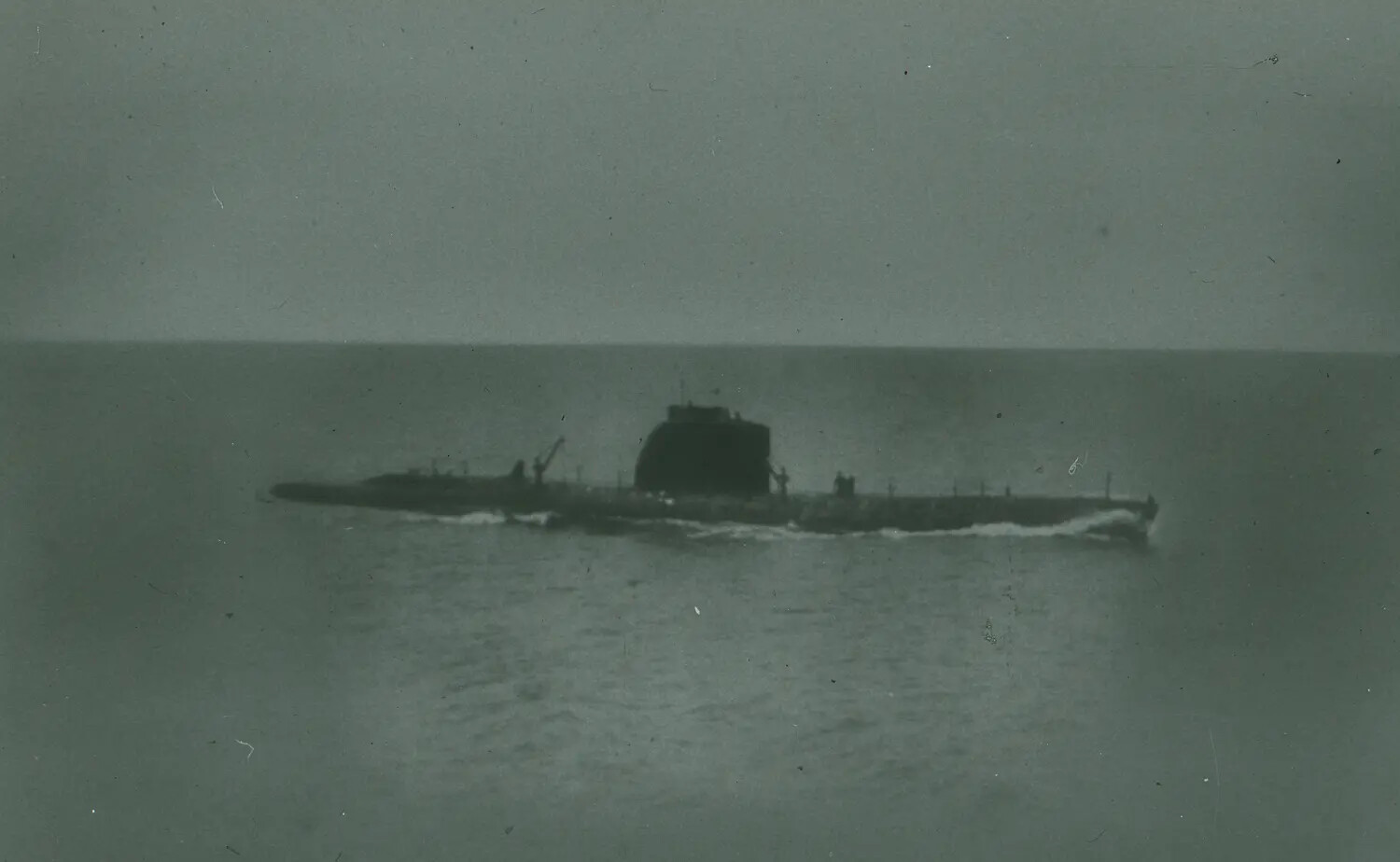 WWII-Era Submarine Underway on the Surface, Distant View