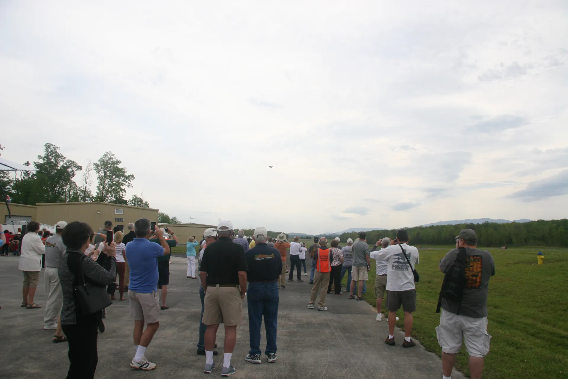 Crowd Near Hangar and Event Tent Watches A-1 Skyraider Flyover, Operation Tailwind Event, 2016